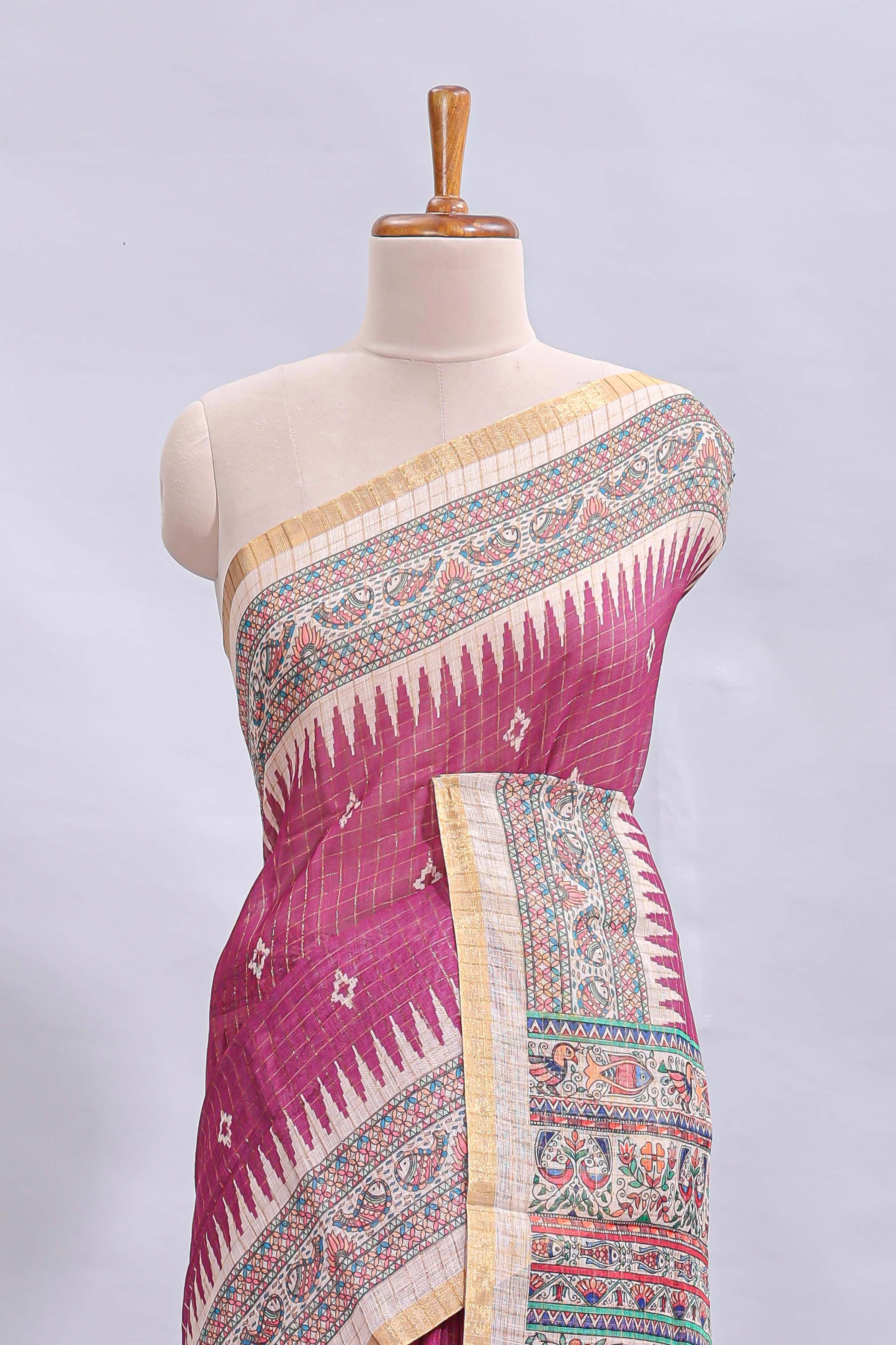 Magenta checked motifs design linen cotton saree with contrast zari border and printed blouse