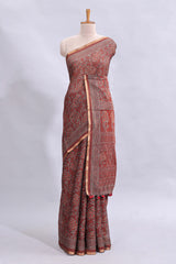 Maroon floral vines design linen cotton saree with self zari border and matching motifs blouse