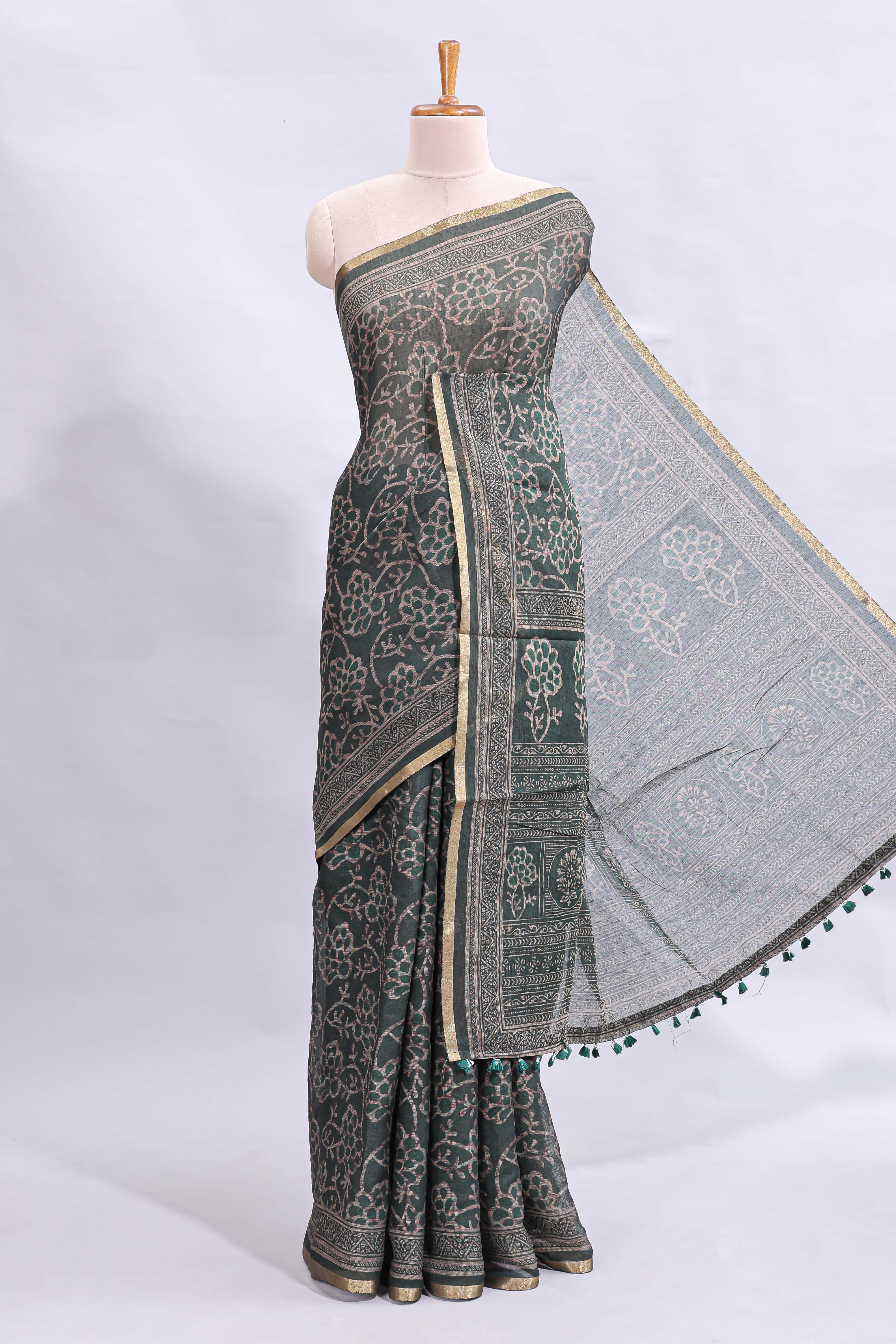 Bottle green floral vines design linen cotton saree with self zari border and matching motifs blouse