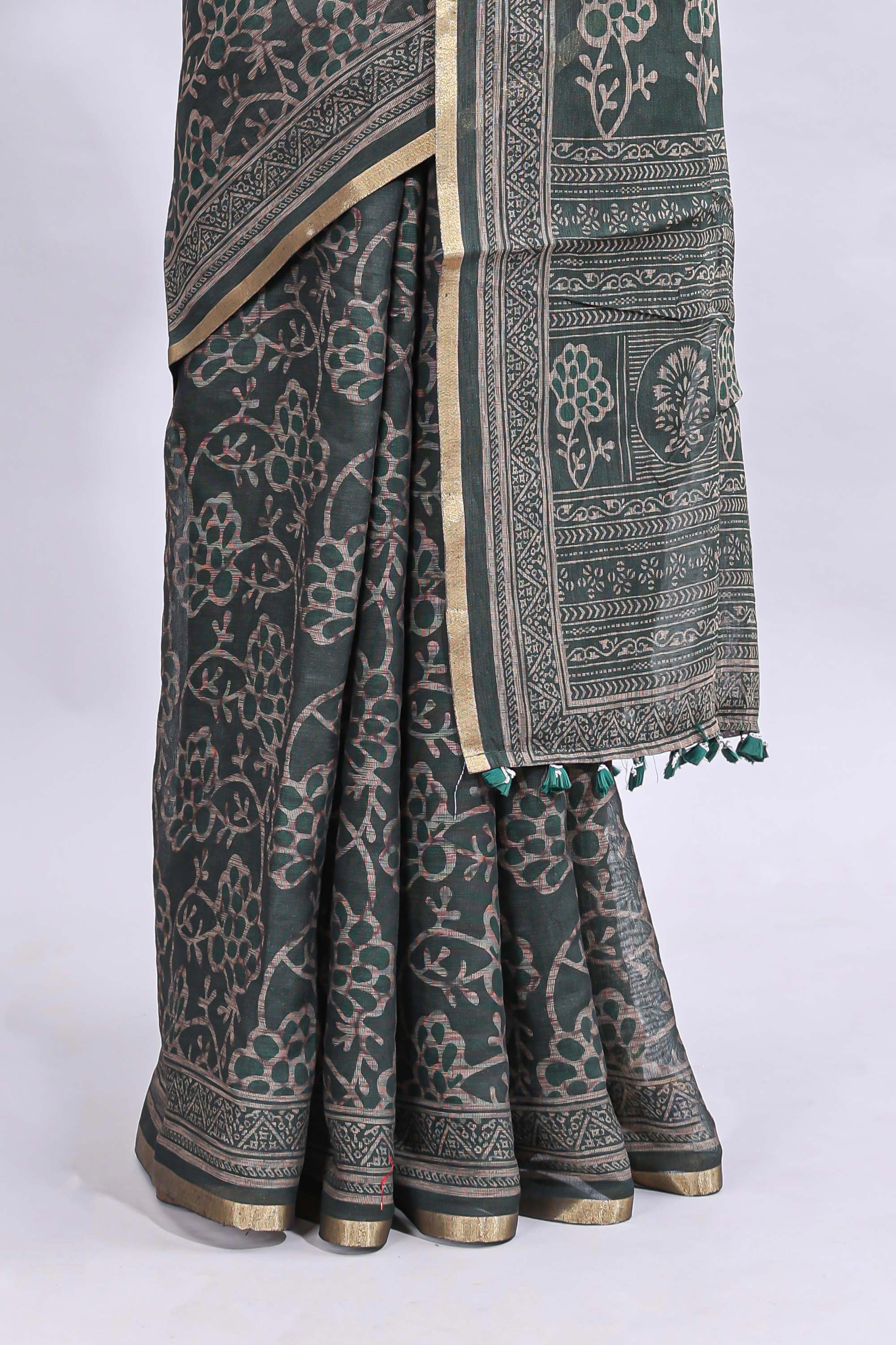 Bottle green floral vines design linen cotton saree with self zari border and matching motifs blouse