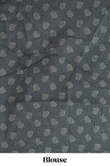 Bottle green floral vines design linen cotton saree with self zari border and matching motifs blouse