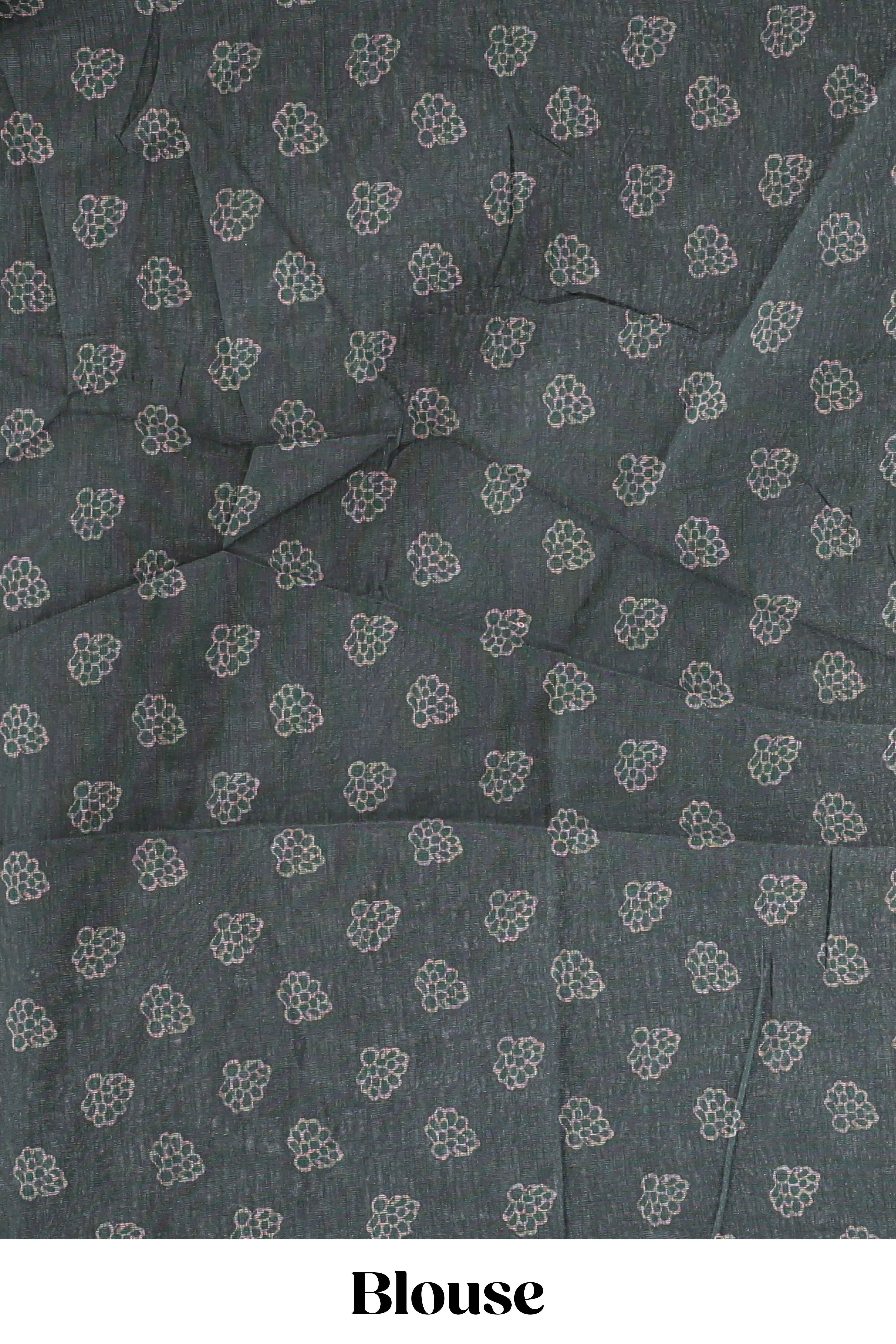 Bottle green floral vines design linen cotton saree with self zari border and matching motifs blouse