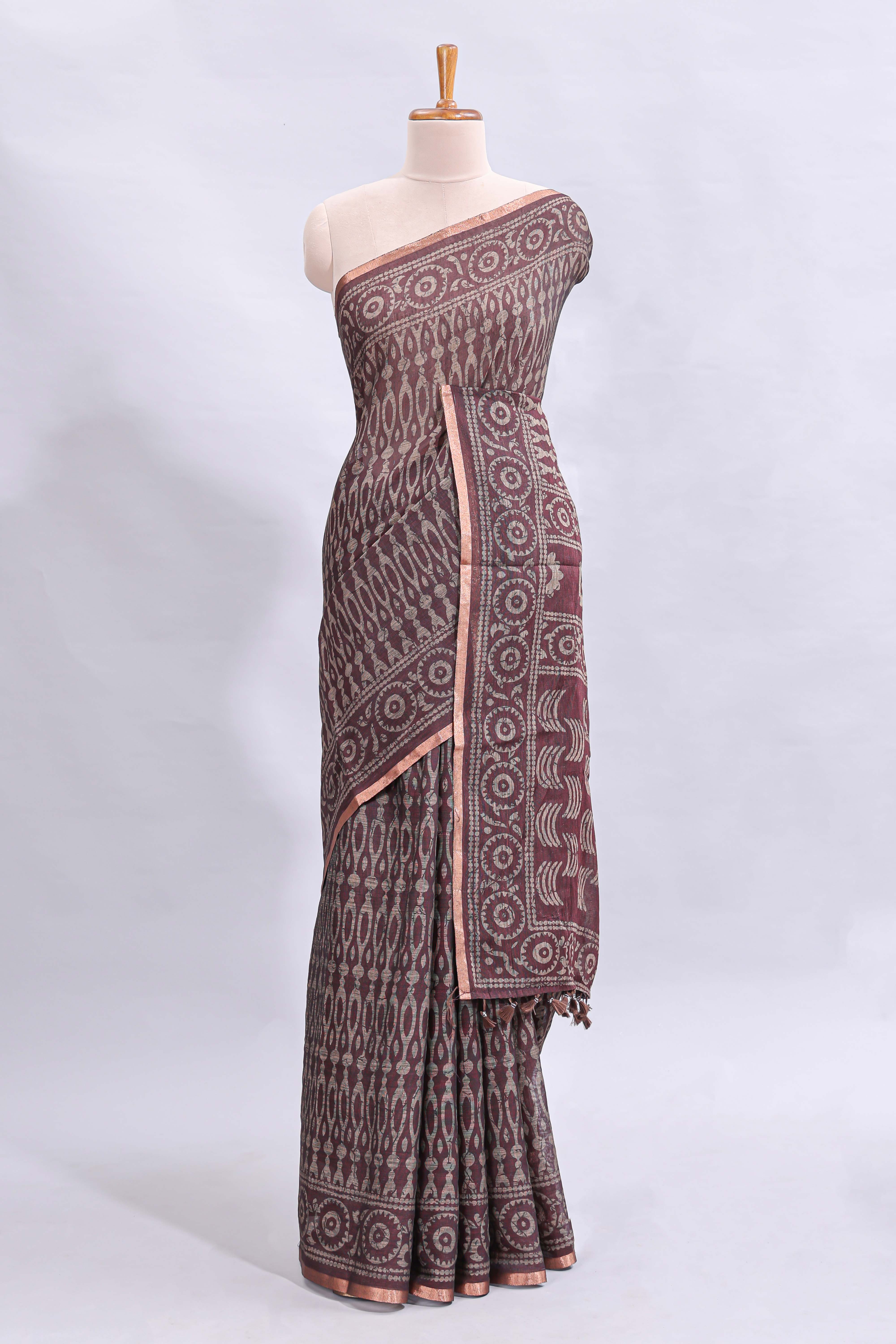 Brown ajrakh printed design linen cotton saree with self zari border and matching printed blouse