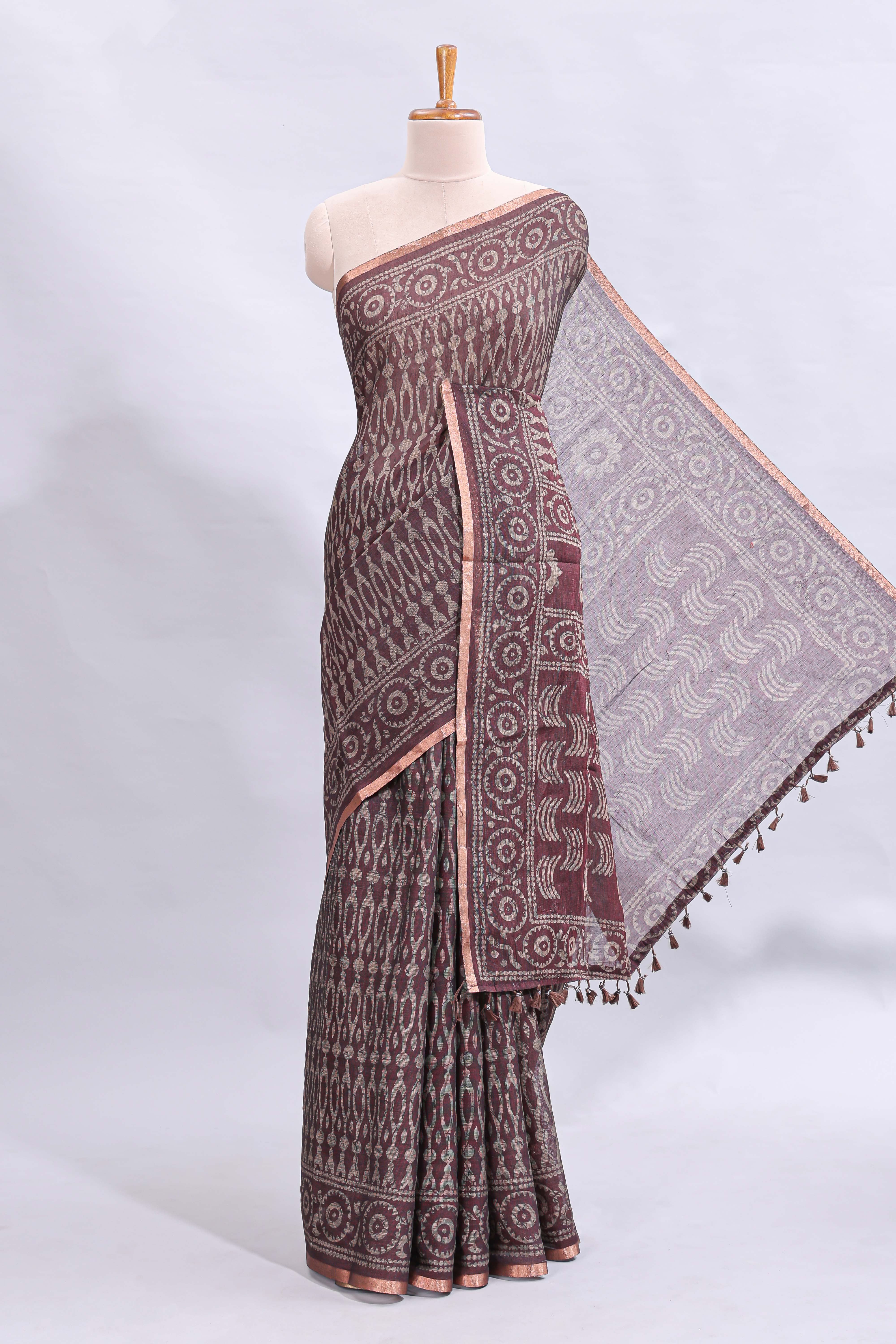 Brown ajrakh printed design linen cotton saree with self zari border and matching printed blouse