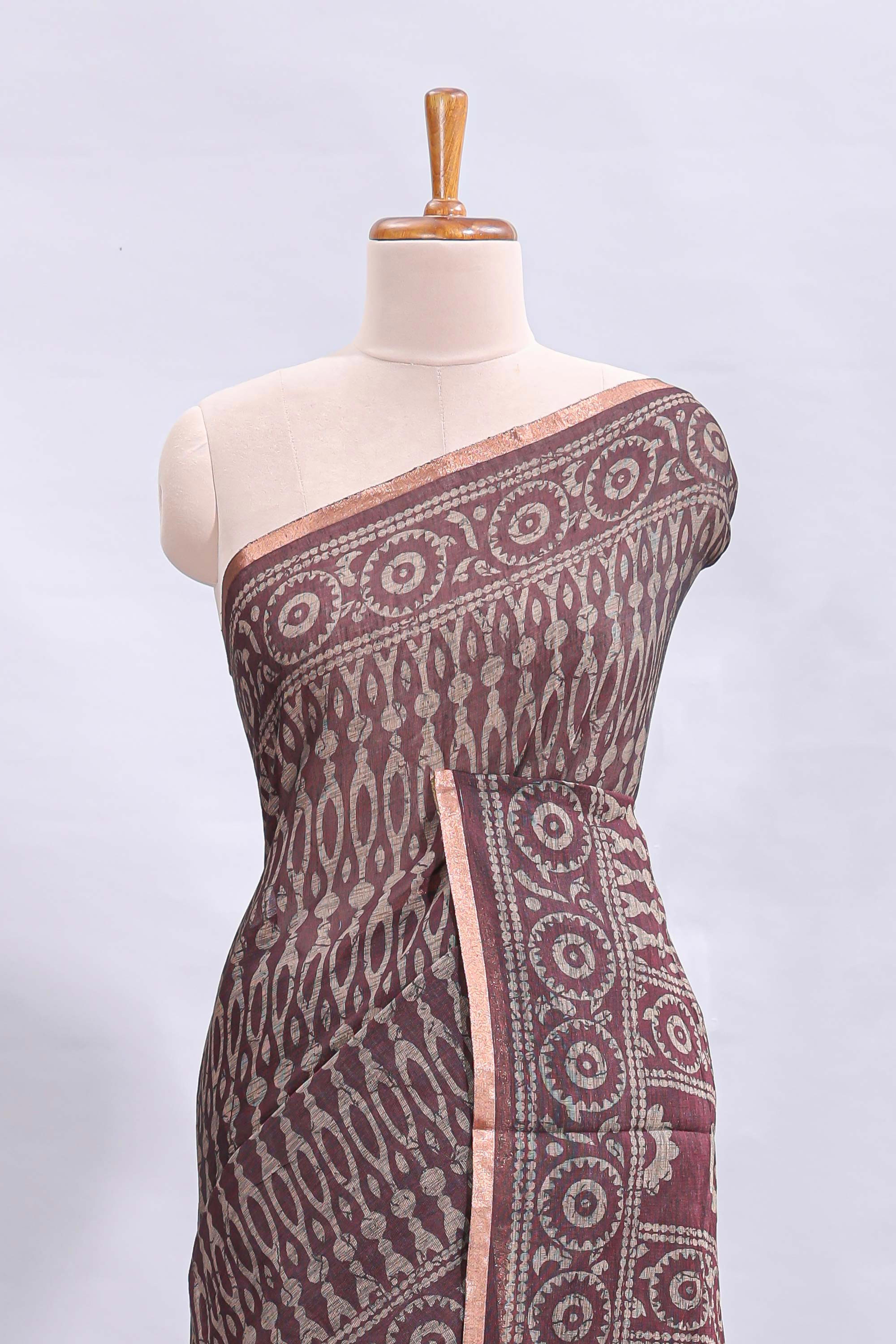 Brown ajrakh printed design linen cotton saree with self zari border and matching printed blouse