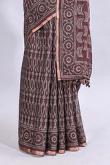 Brown ajrakh printed design linen cotton saree with self zari border and matching printed blouse