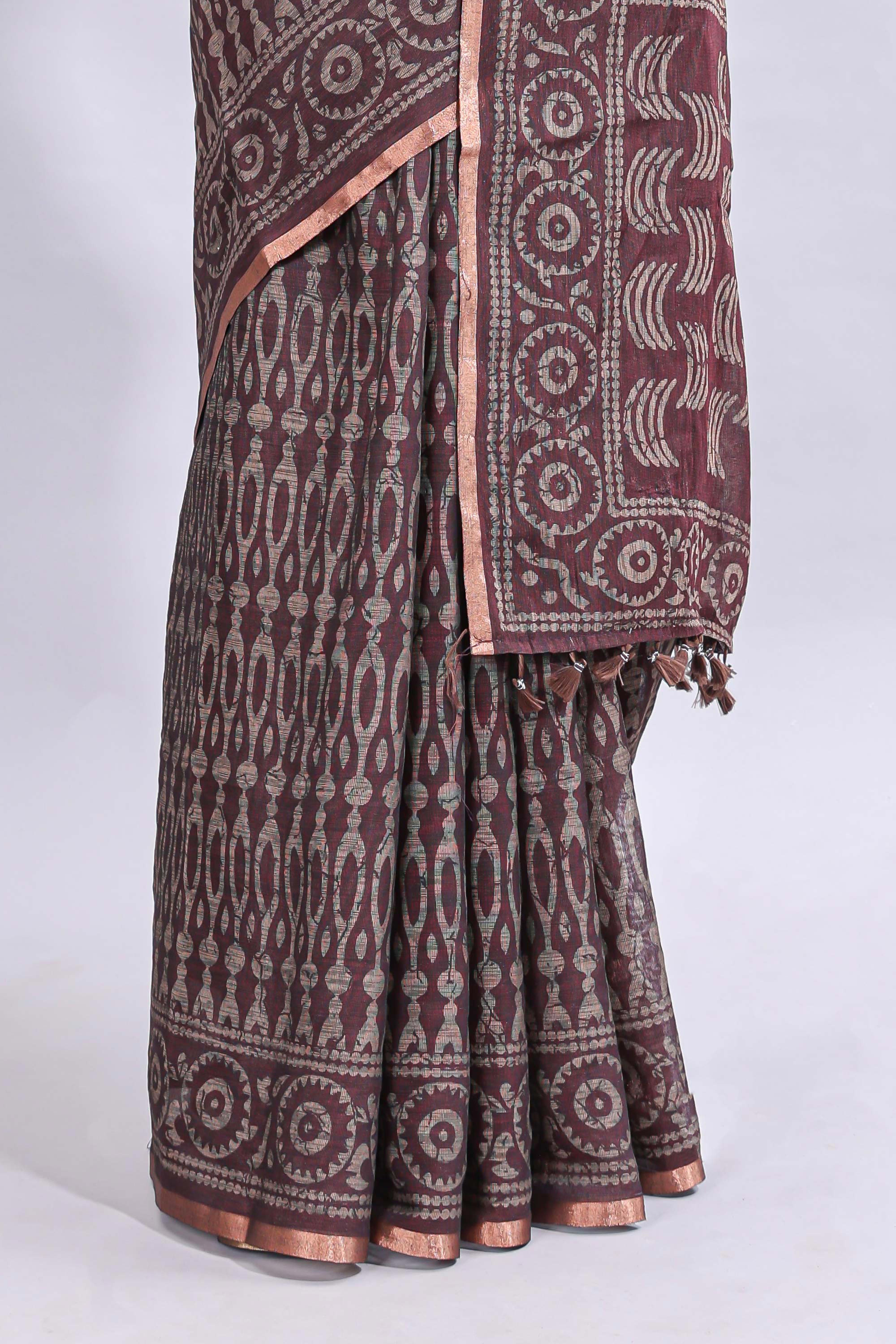 Brown ajrakh printed design linen cotton saree with self zari border and matching printed blouse