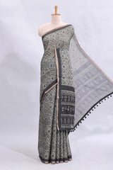 Grey warli tribe design linen cotton saree with contrast zari border and printed blouse