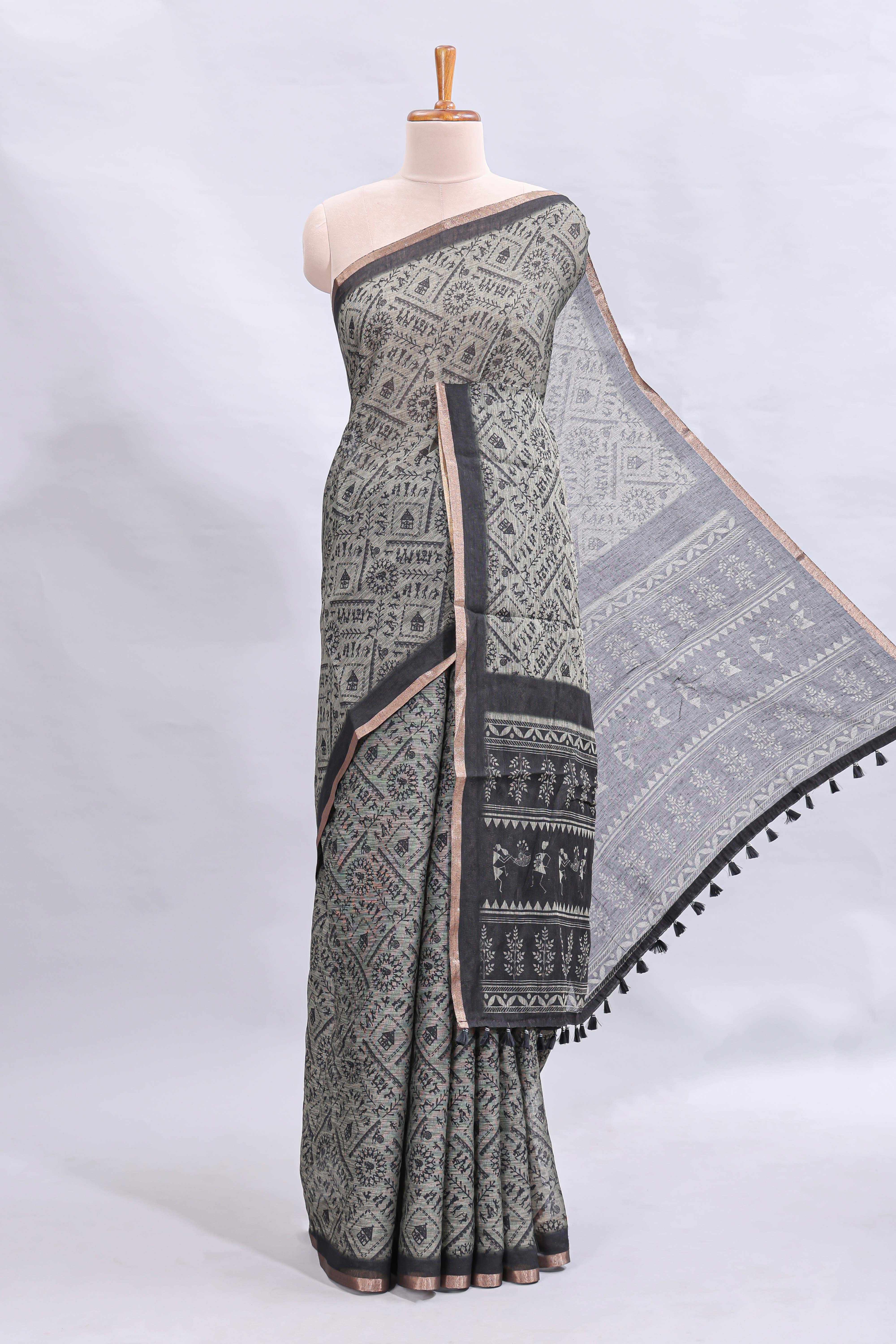 Grey warli tribe design linen cotton saree with contrast zari border and printed blouse