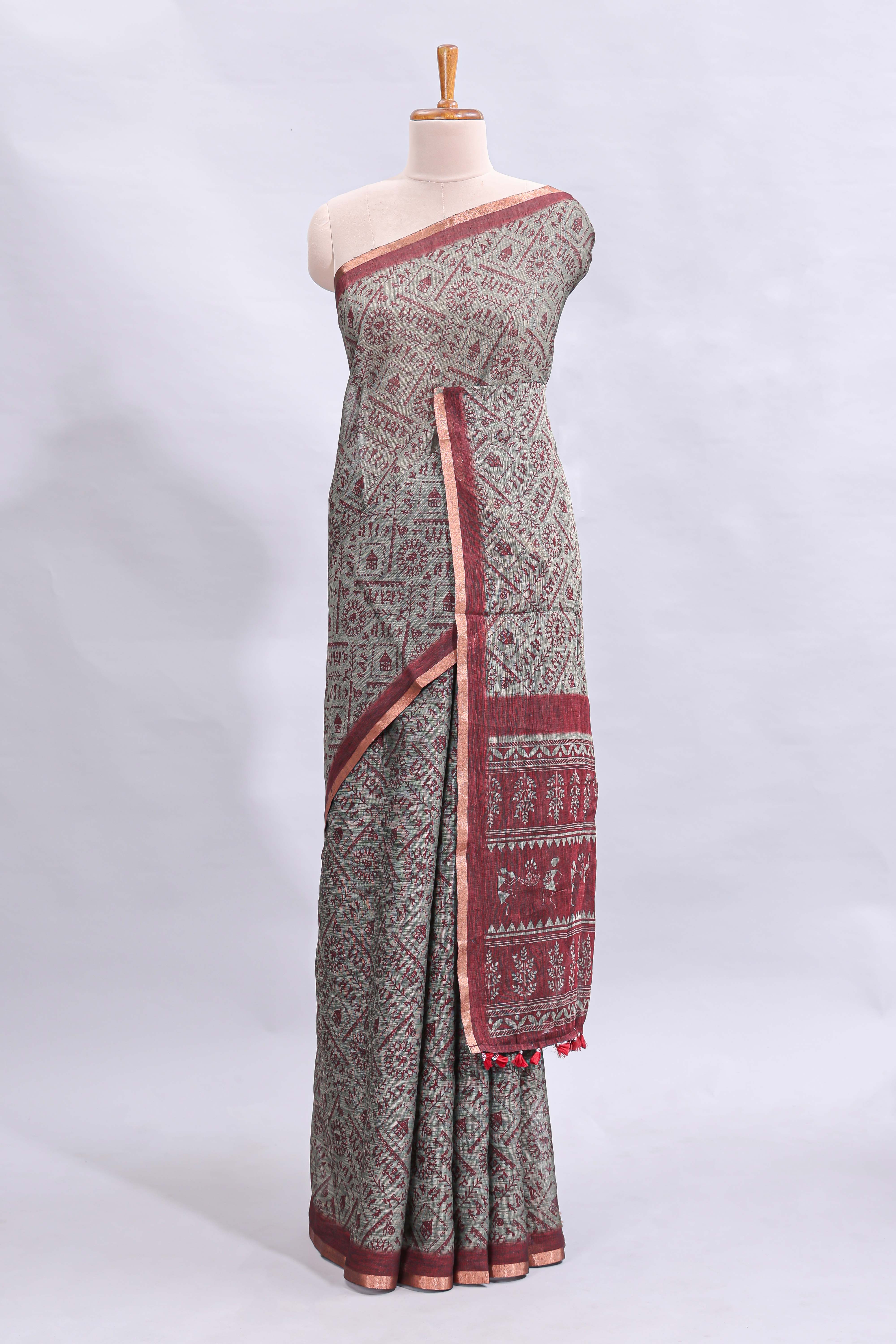 Grey warli tribe design linen cotton saree with contrast zari border and printed blouse