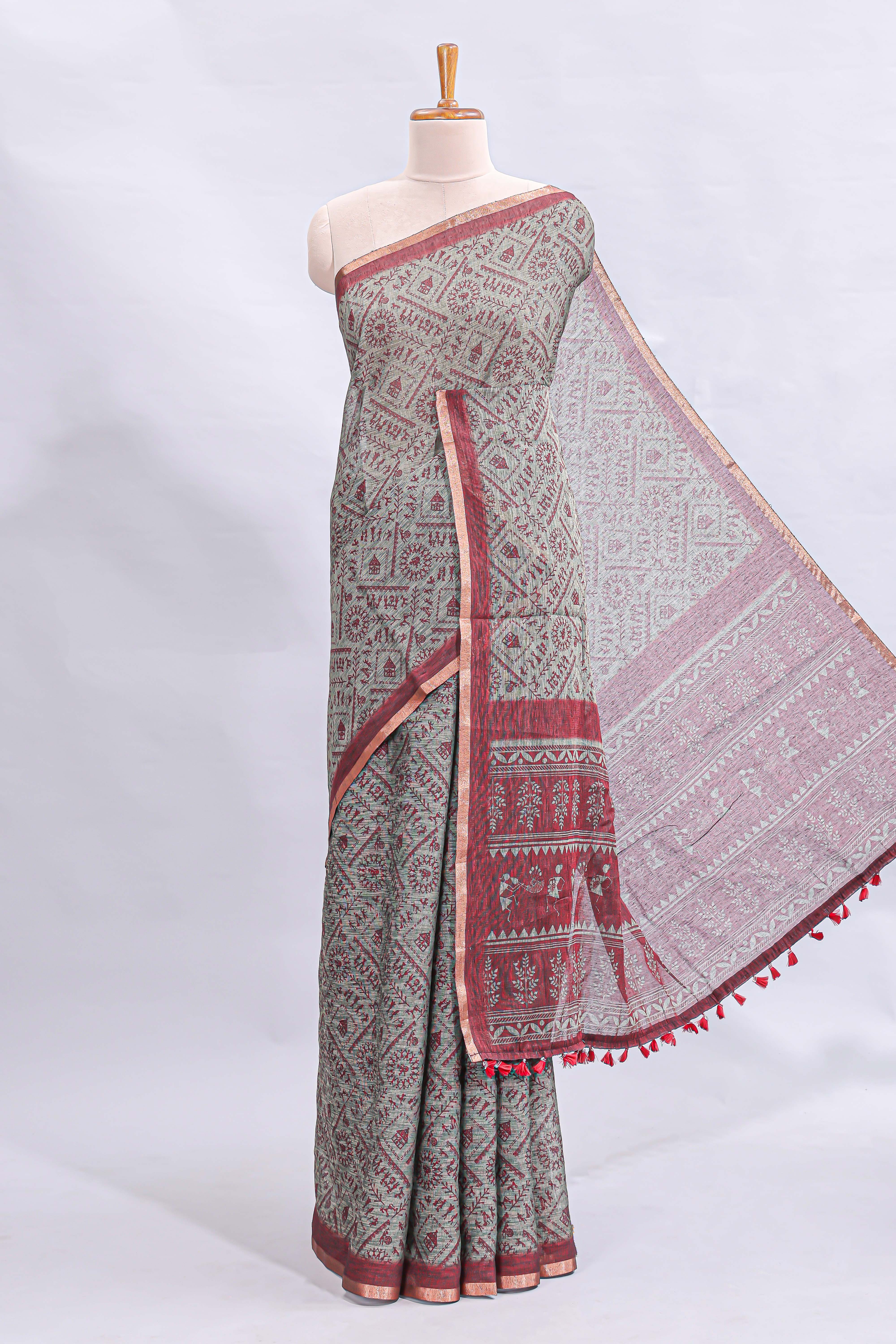 Grey warli tribe design linen cotton saree with contrast zari border and printed blouse