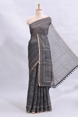 Black floral design linen cotton saree with self zari border and matching printed blouse