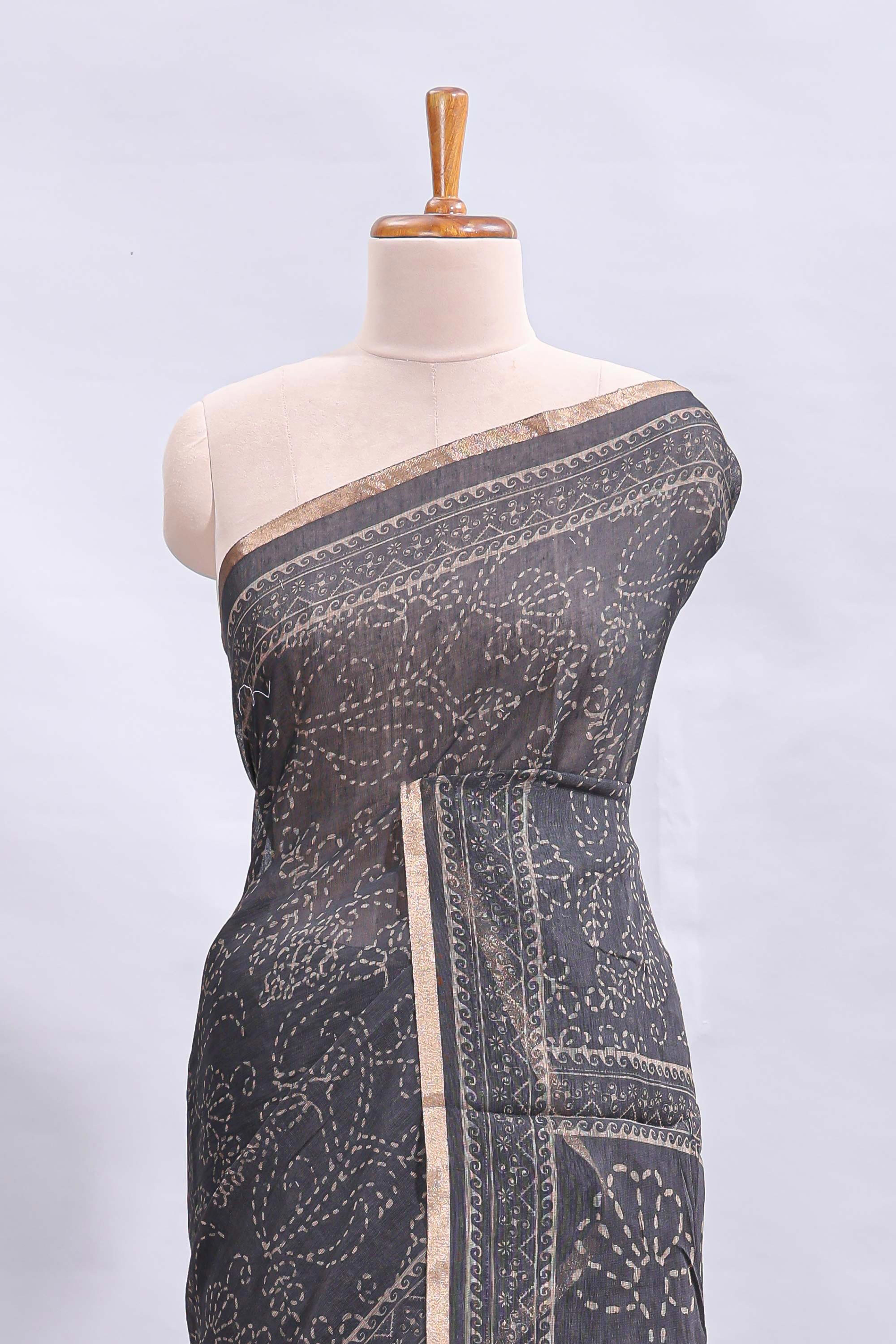 Black floral design linen cotton saree with self zari border and matching printed blouse