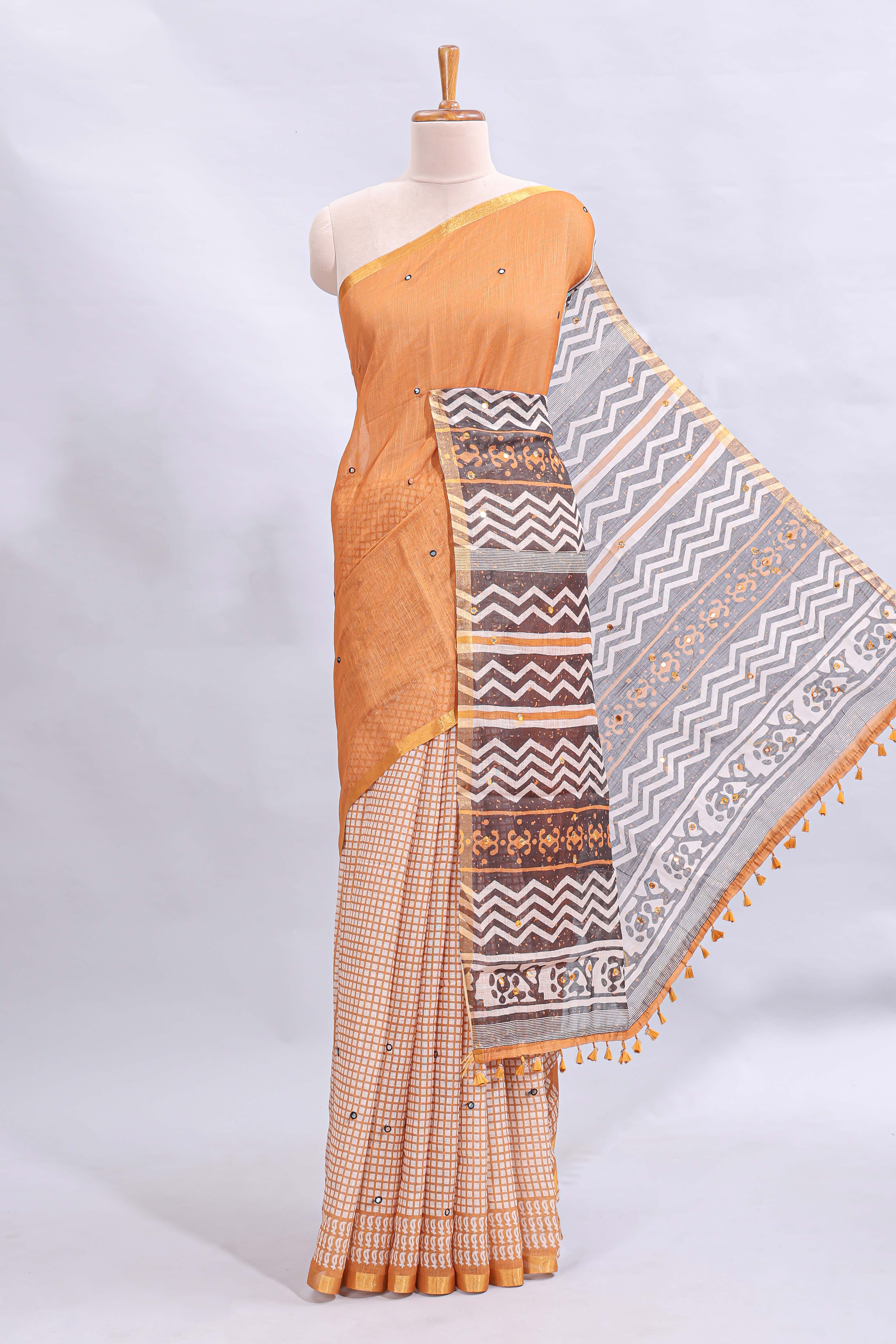 Orange mirror work embroidery design linen cotton saree with self zari border and matching checked blouse