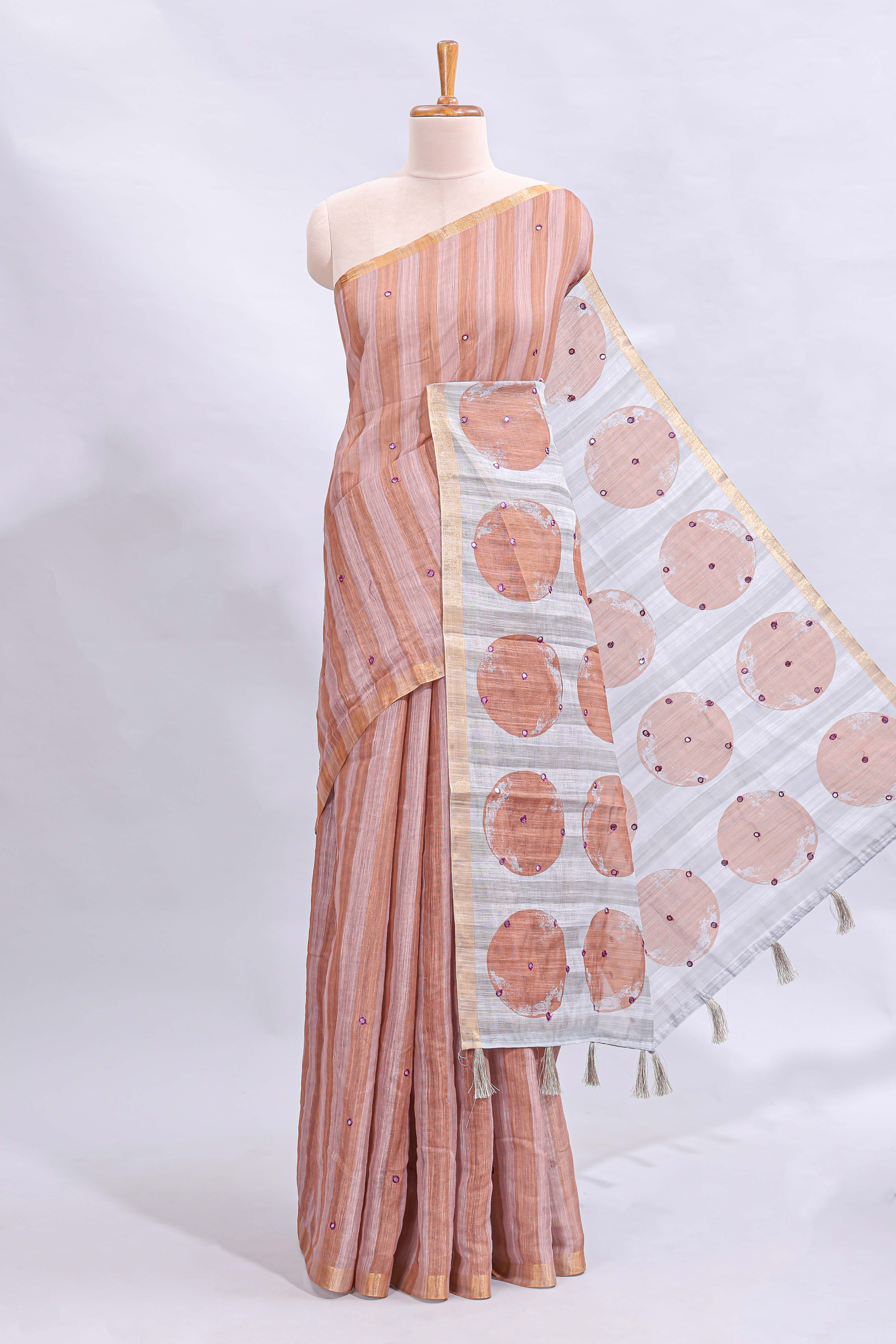 Peach striped mirror embroidery work linen cotton saree with self zari border and contrast printed pallu