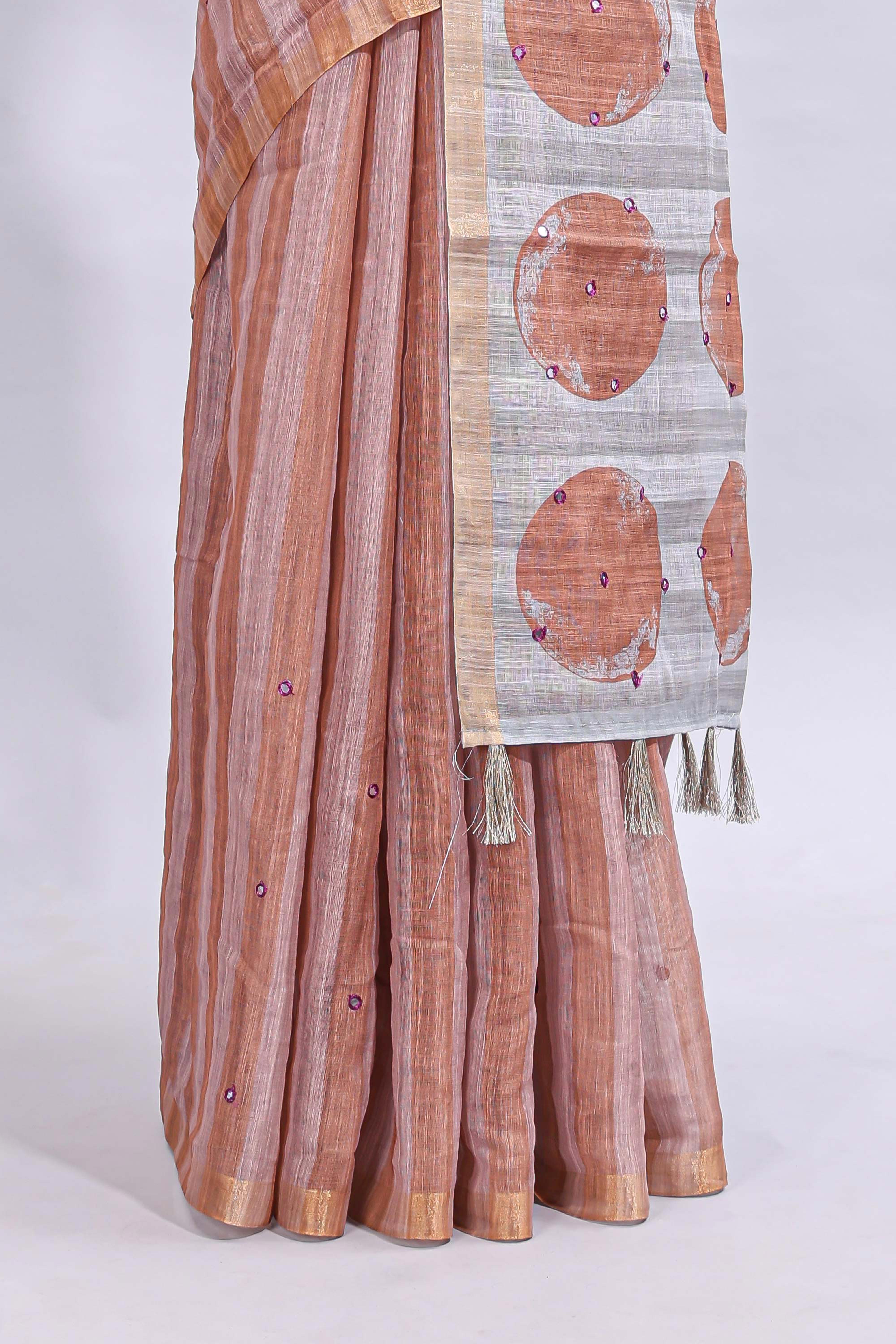 Peach striped mirror embroidery work linen cotton saree with self zari border and contrast printed pallu