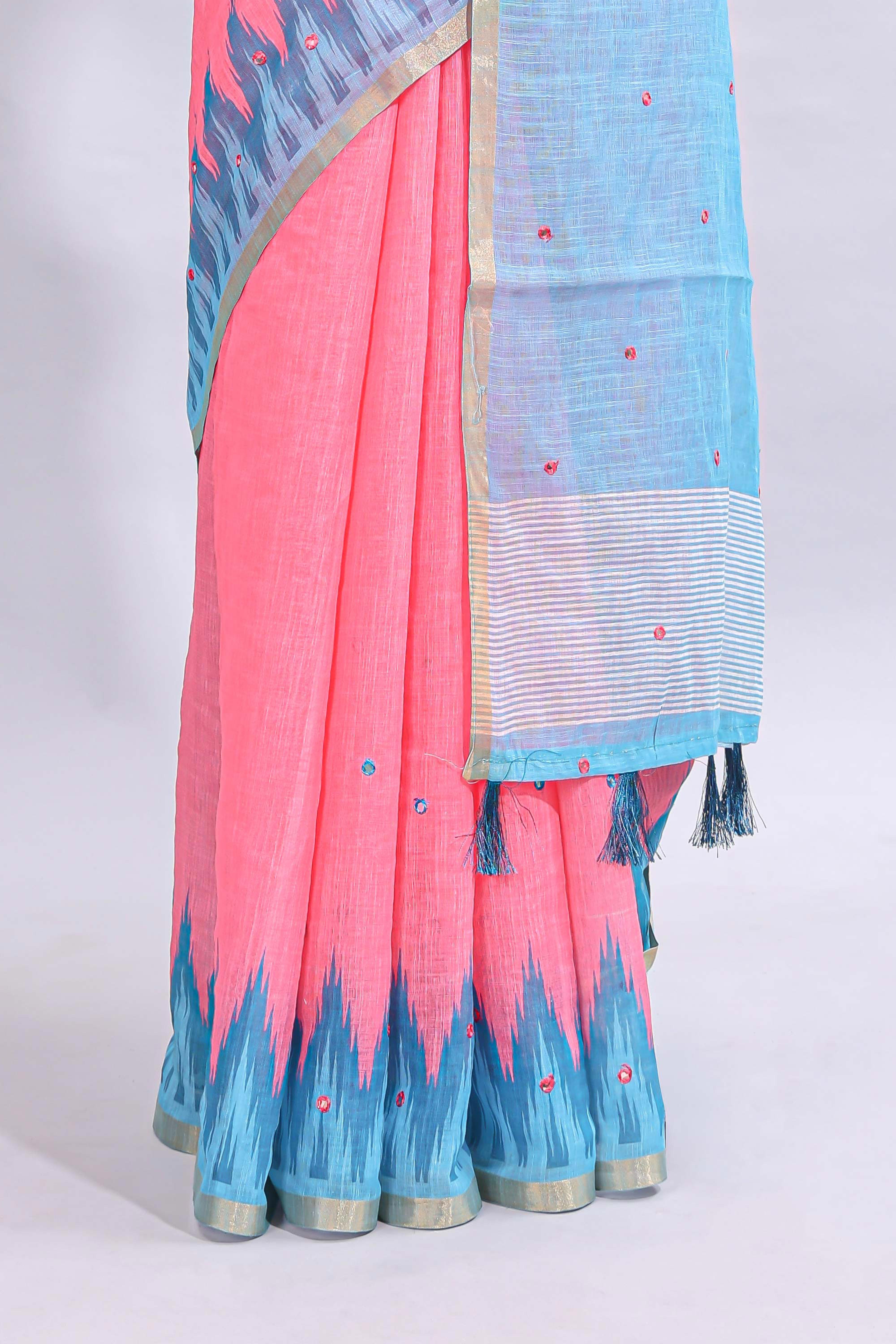 Pink mirror embroidery work linen cotton saree with contrast ikkat style border and striped blouse