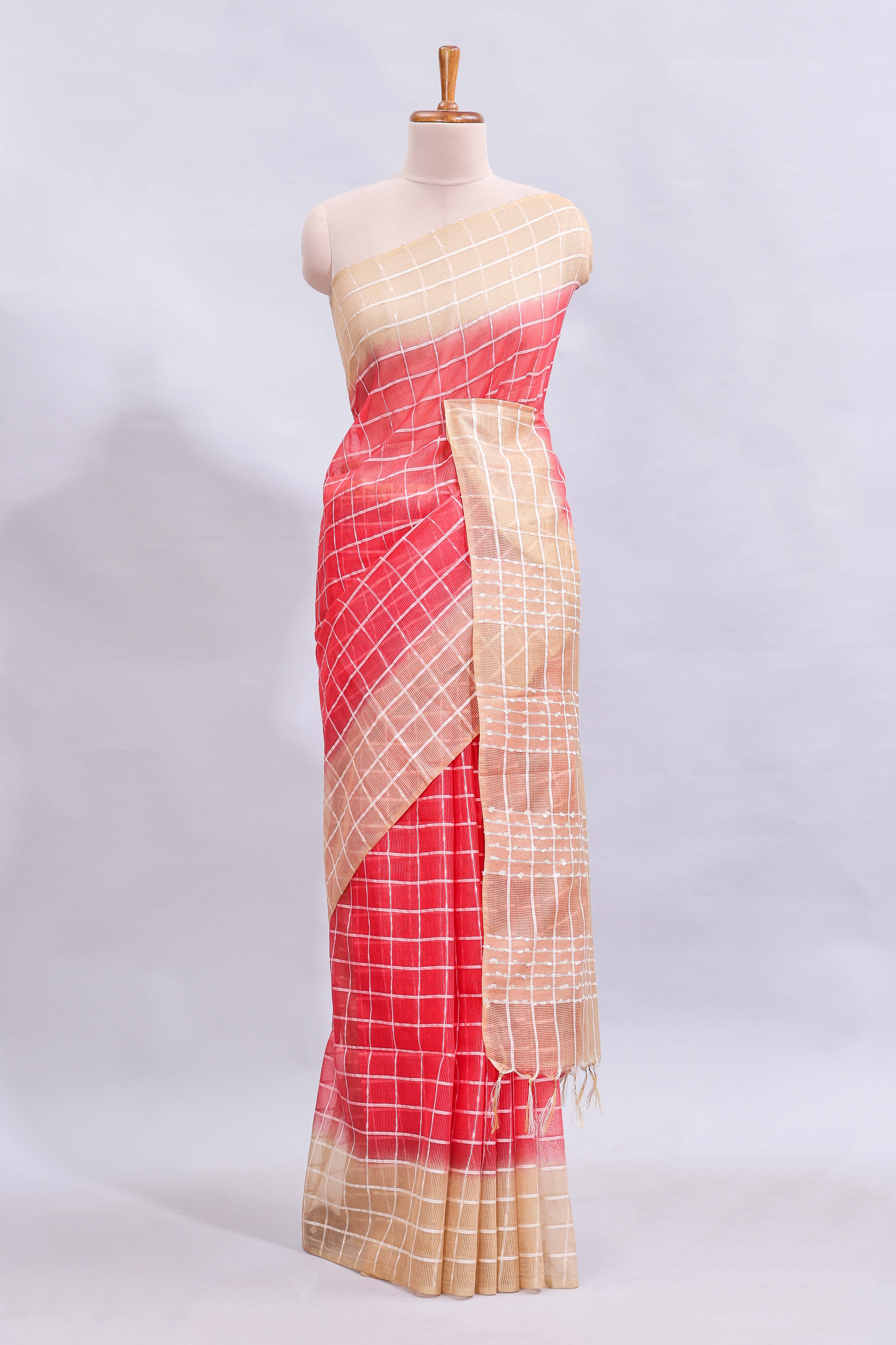 Pink checked linen cotton saree with contrast border and striped blouse
