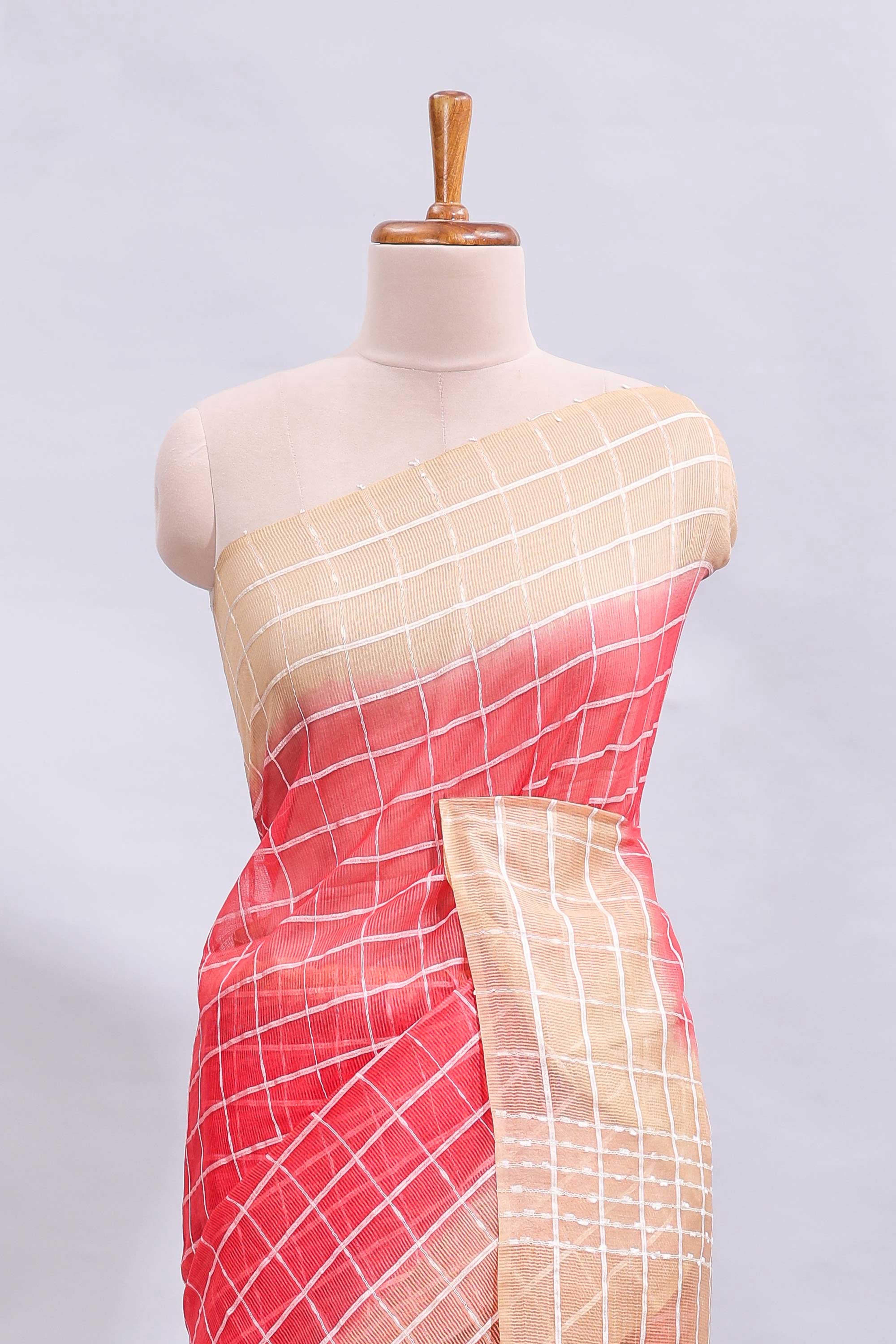 Pink checked linen cotton saree with contrast border and striped blouse