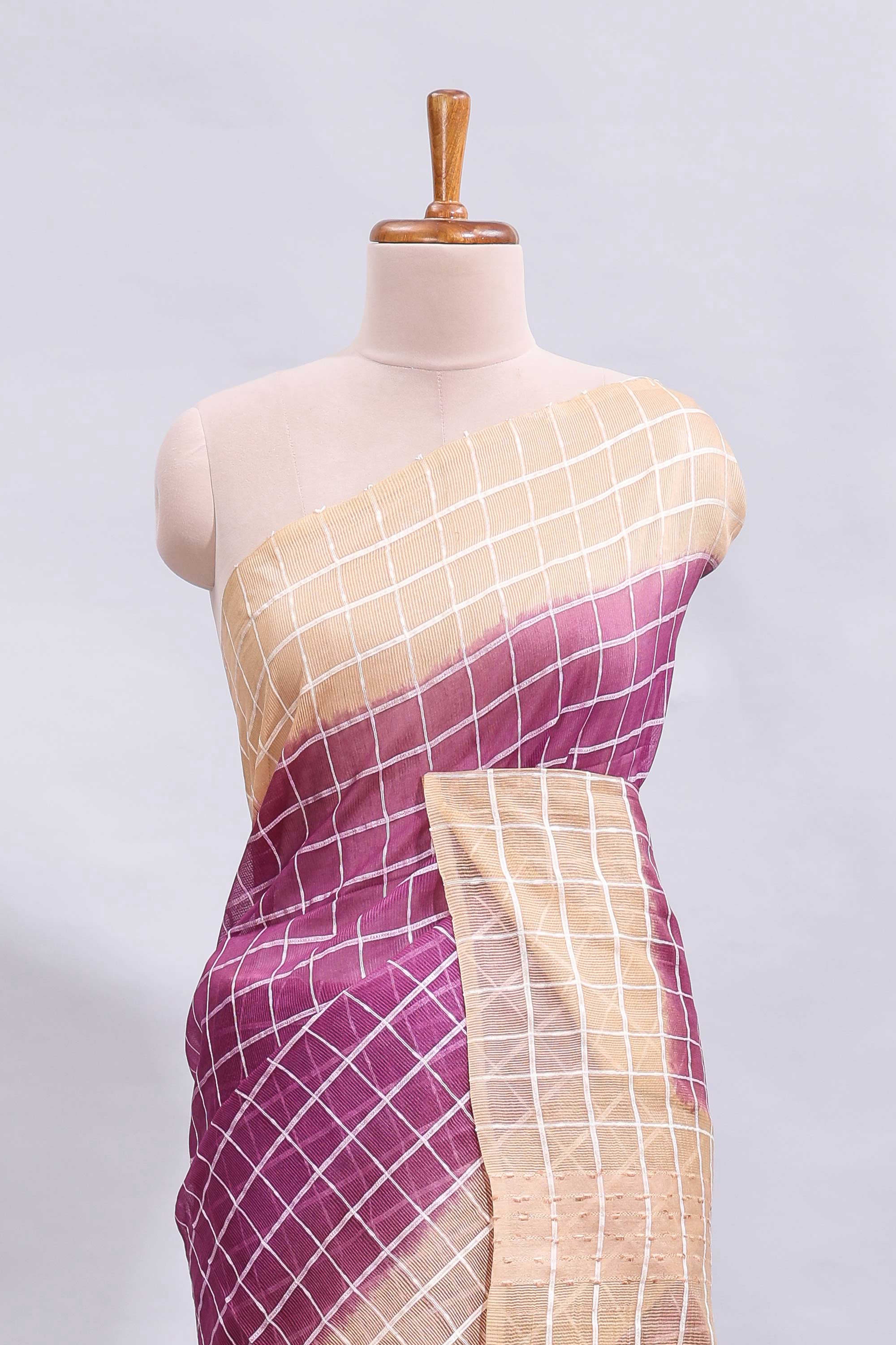 Magenta checked linen cotton saree with contrast border and striped blouse