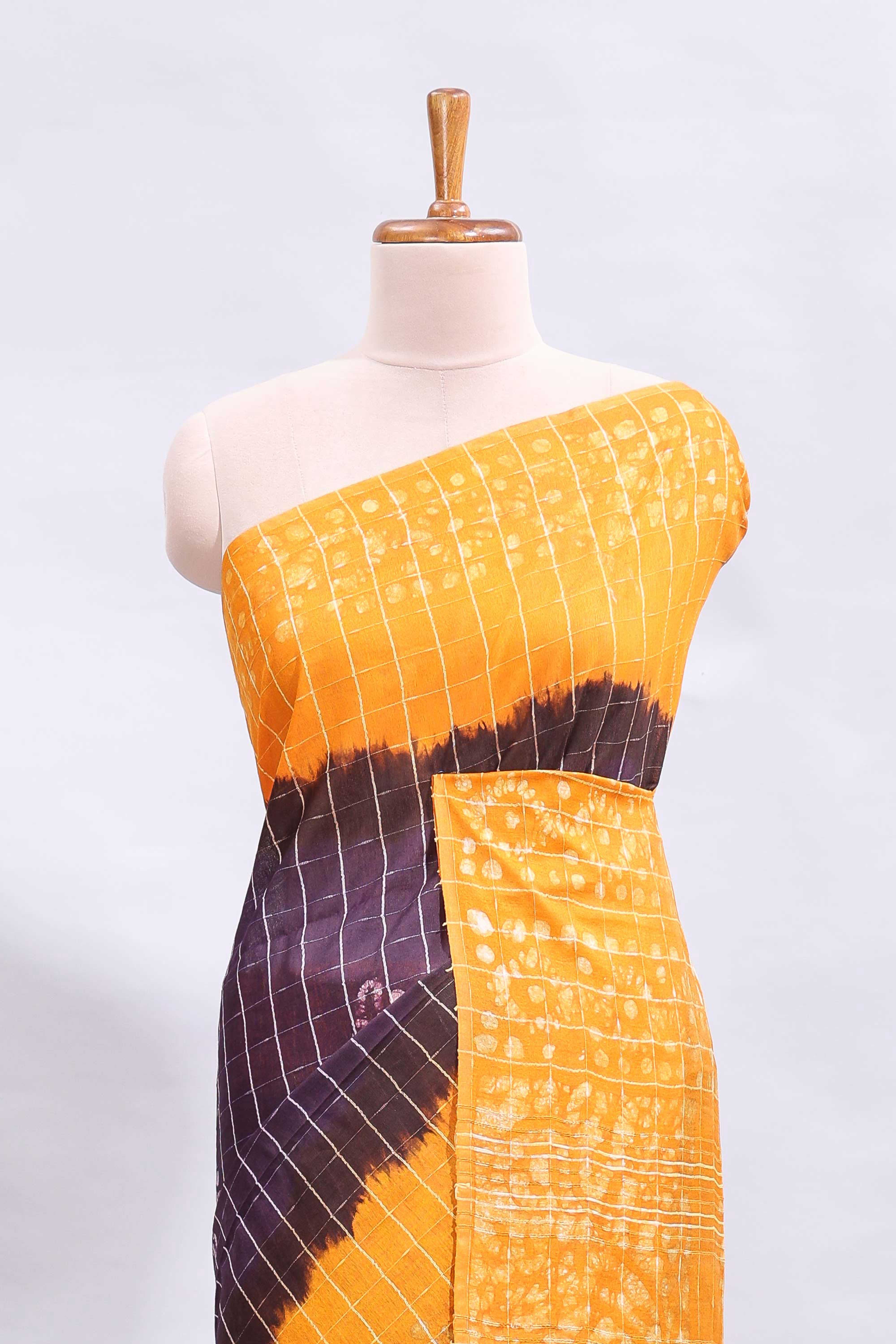 Purple checked shibori motifs design linen cotton saree with contrast border and checked blouse