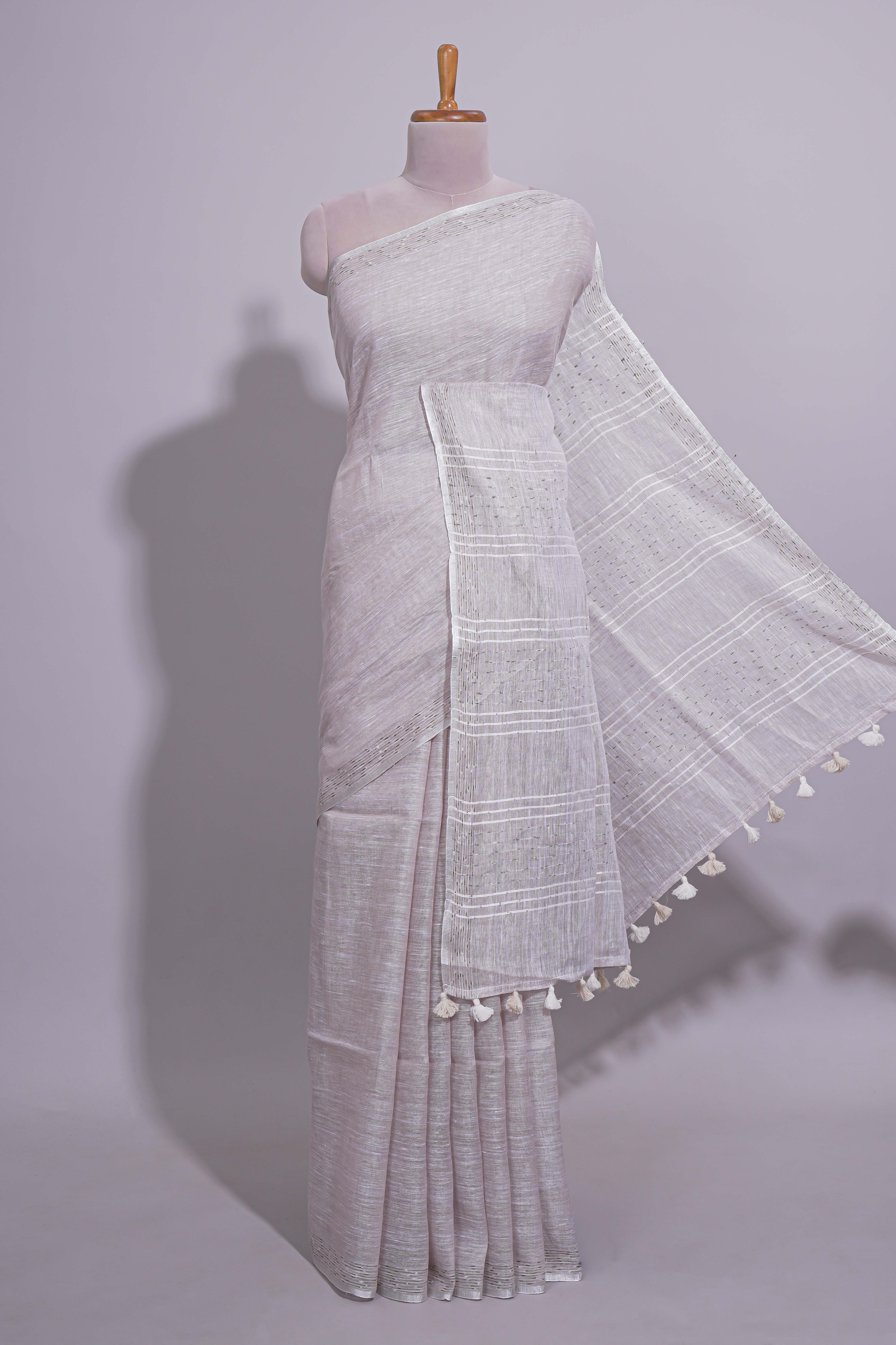 Grey shade PlainLinen Cotton saree With Matching border and Striped Blouse
