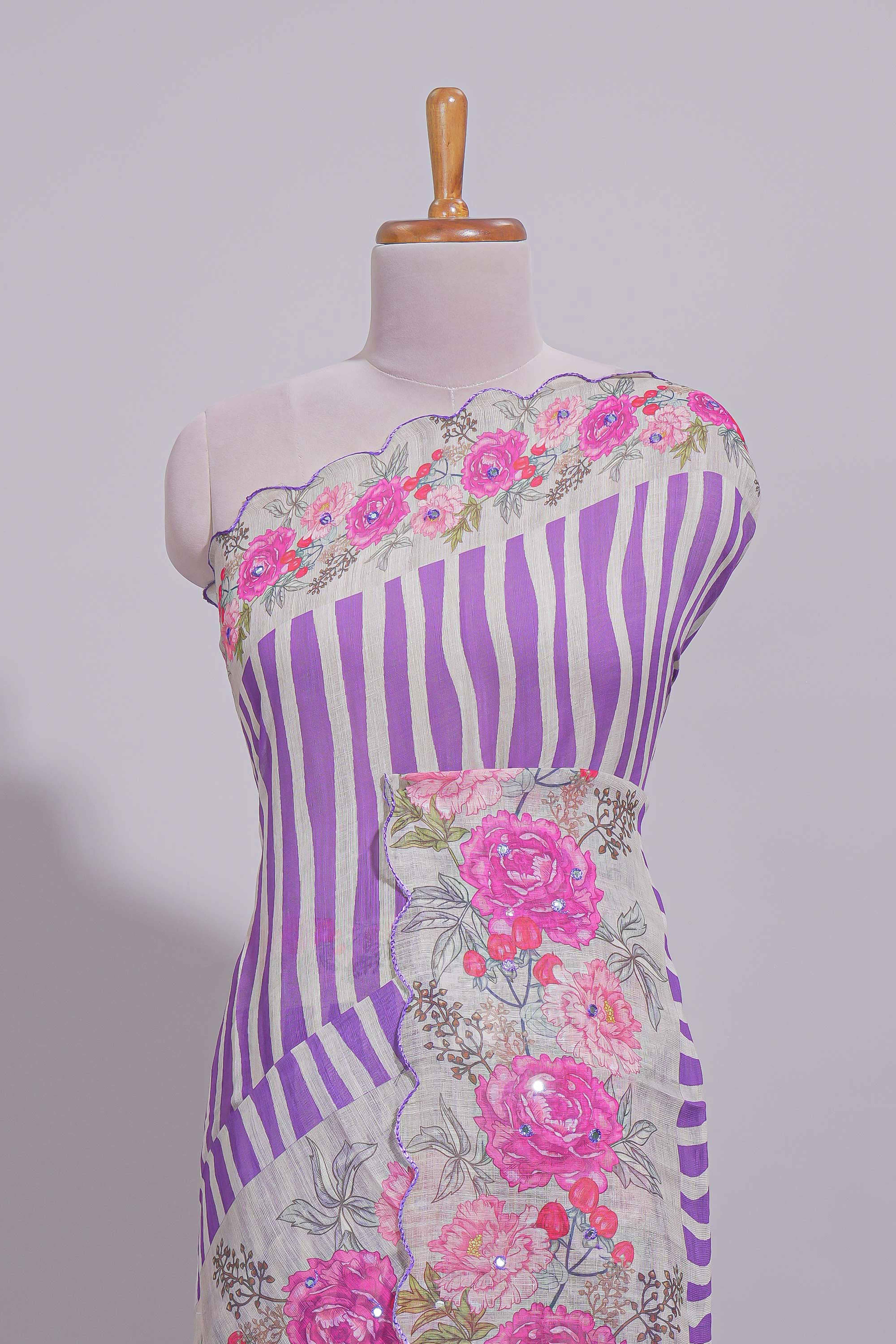 White Linen saree with violet stripes and vibrant pink floral scallop border with contrast printed blouse