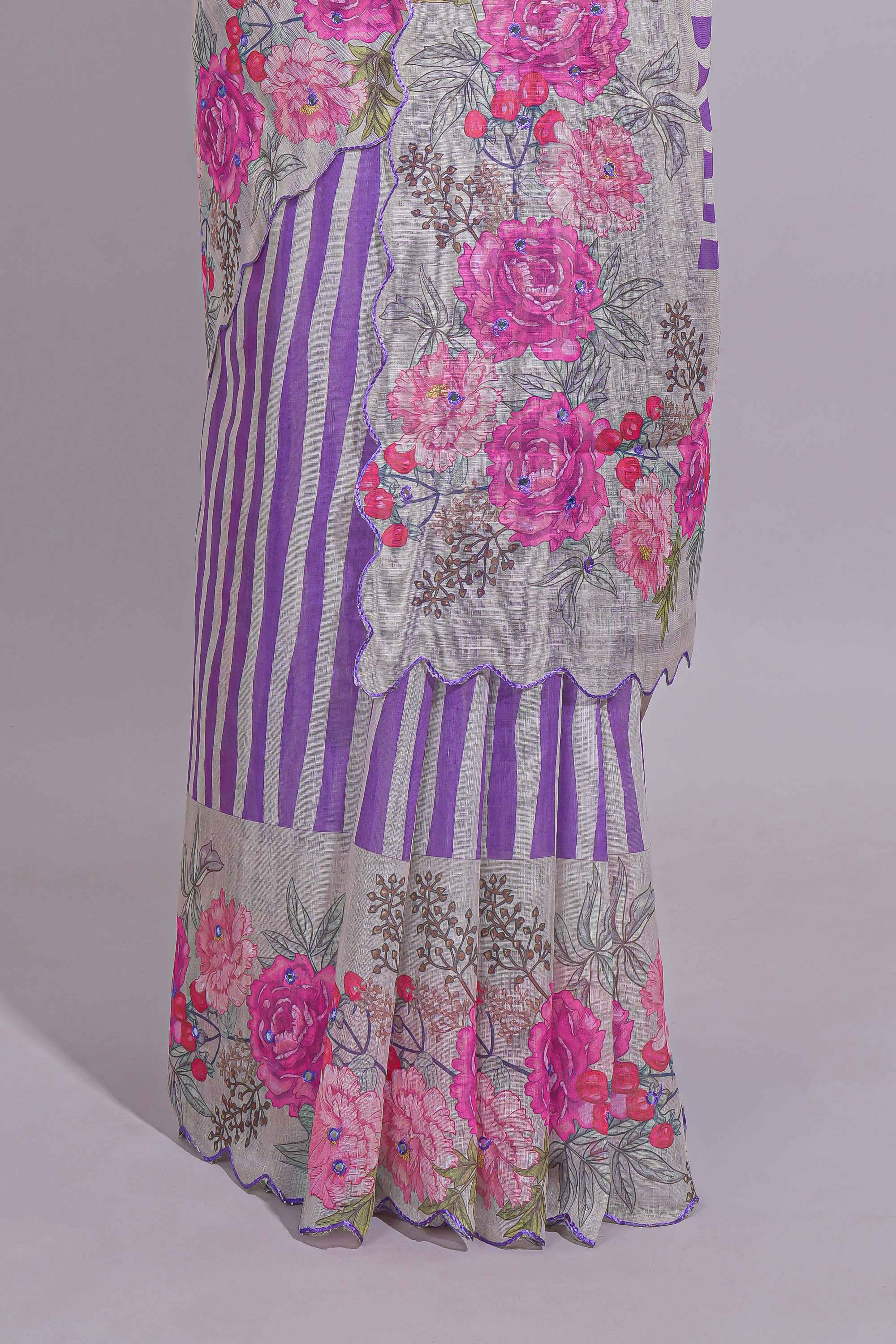 White Linen saree with violet stripes and vibrant pink floral scallop border with contrast printed blouse