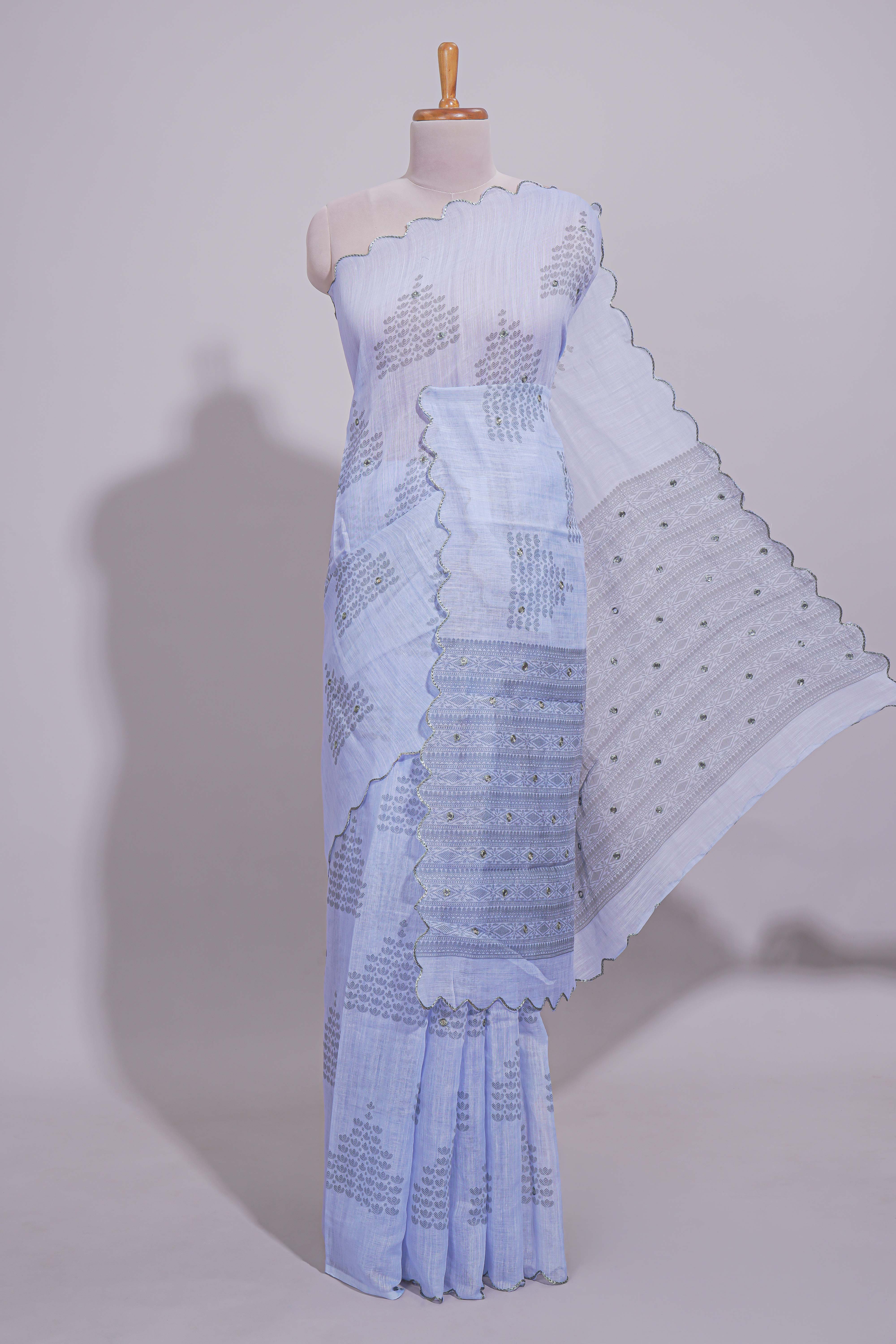 Indigo blue linen saree tiny motifs and sequin with scalloped border and matching blouse
