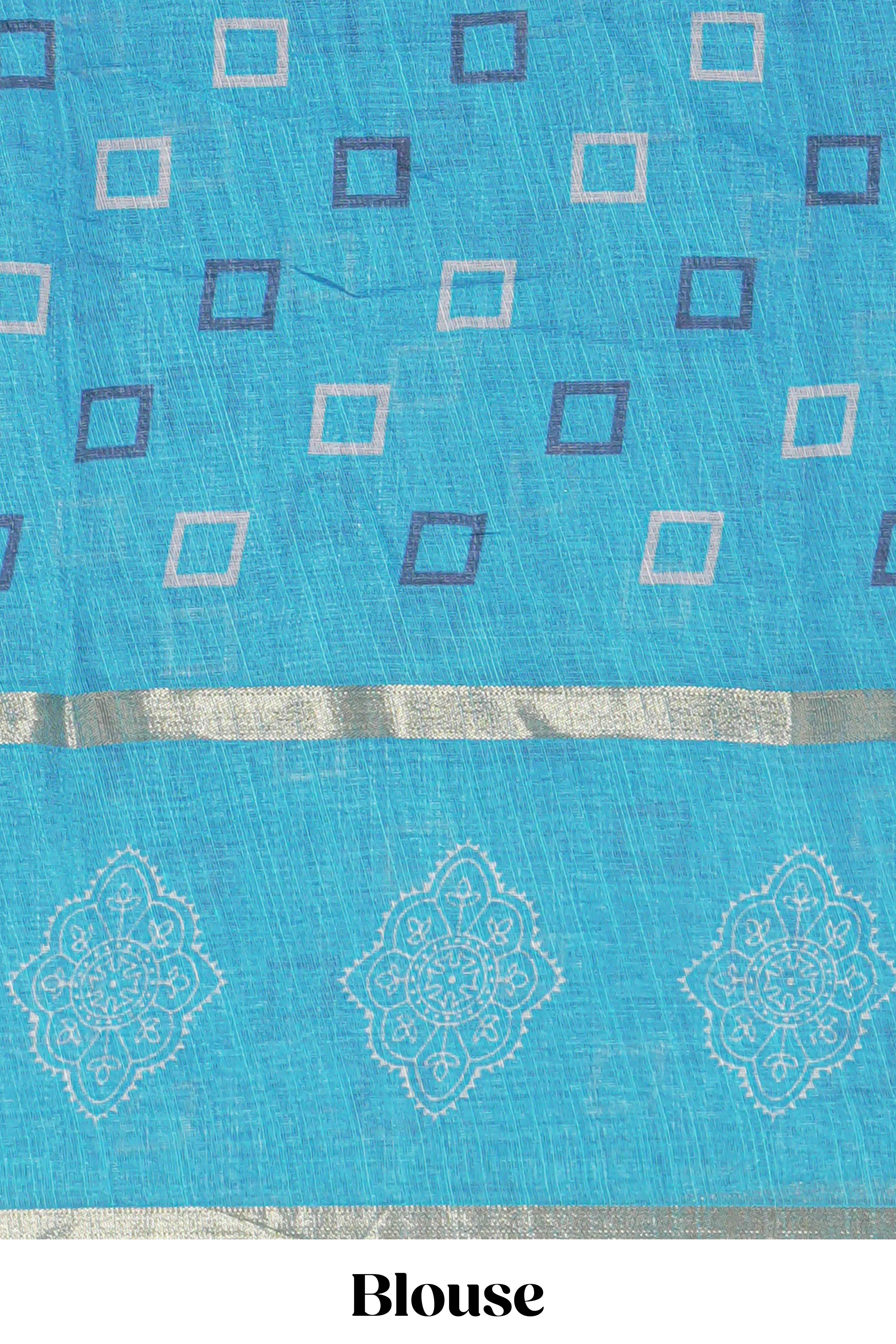 Checked linen saree with contrast blue border and pallu along with contrast printed blouse