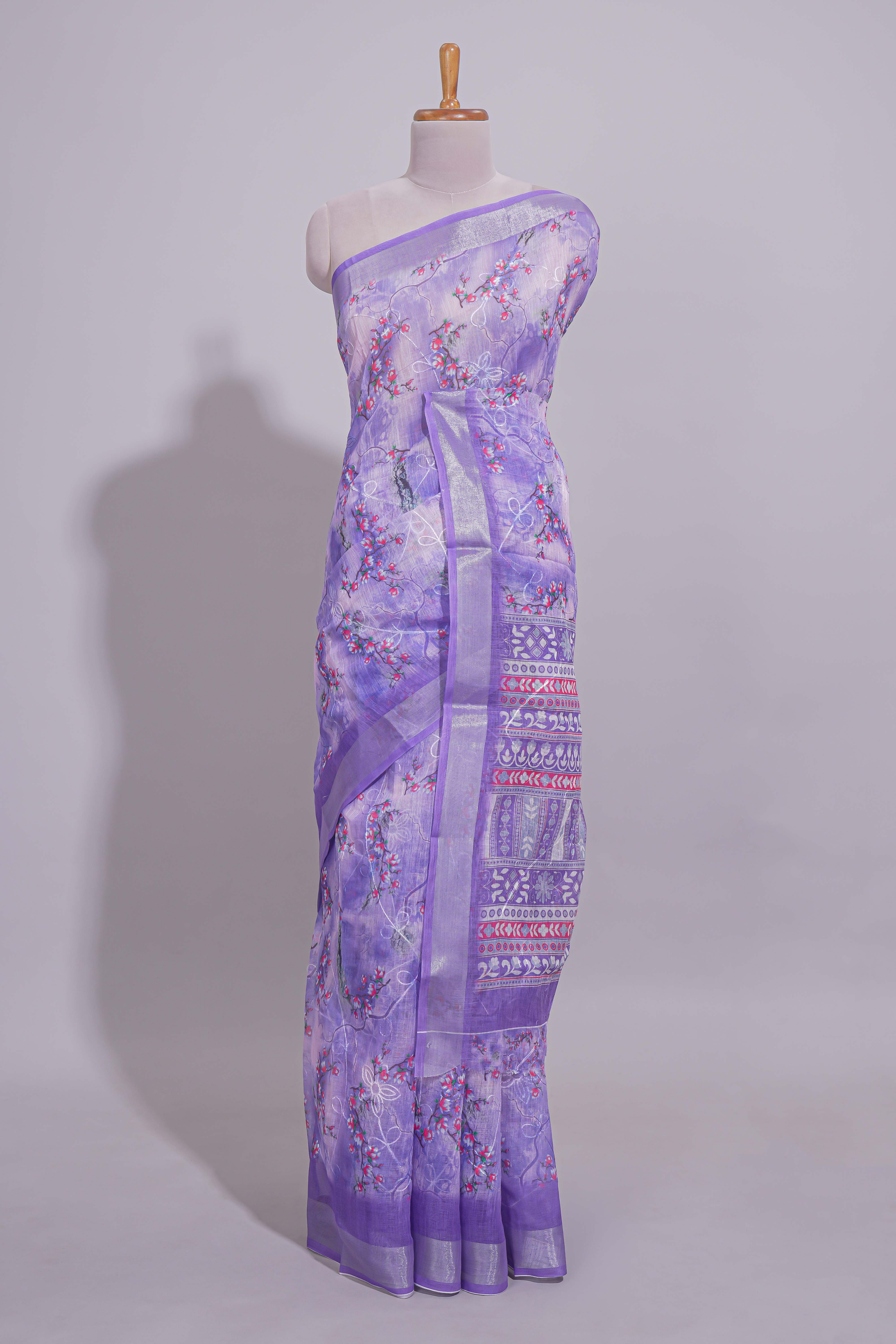 Purple Floral printed linen cotton saree with contrast zariborder and geometric pallu along with matching blouse