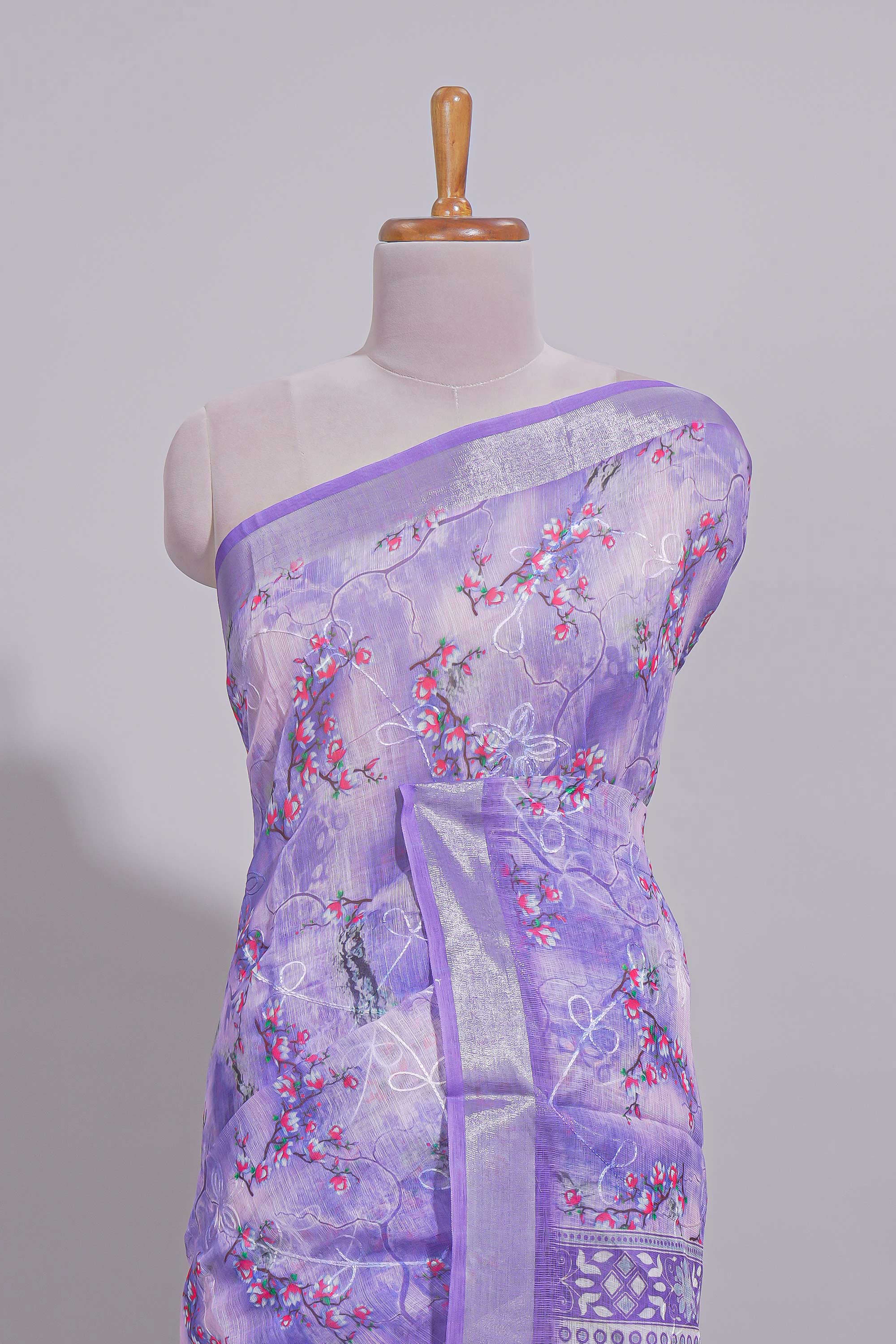 Purple Floral printed linen cotton saree with contrast zariborder and geometric pallu along with matching blouse