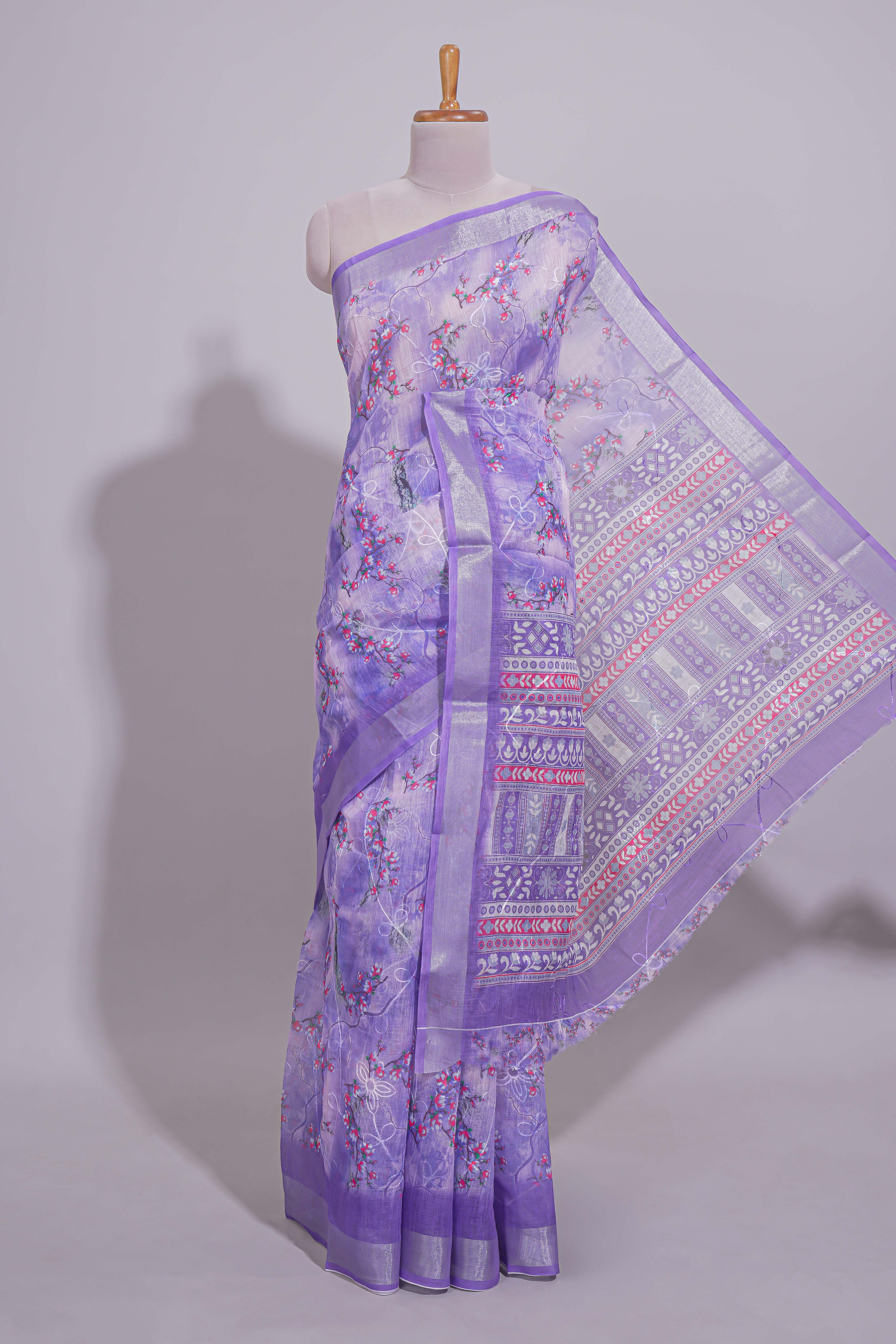 Purple Floral printed linen cotton saree with contrast zariborder and geometric pallu along with matching blouse
