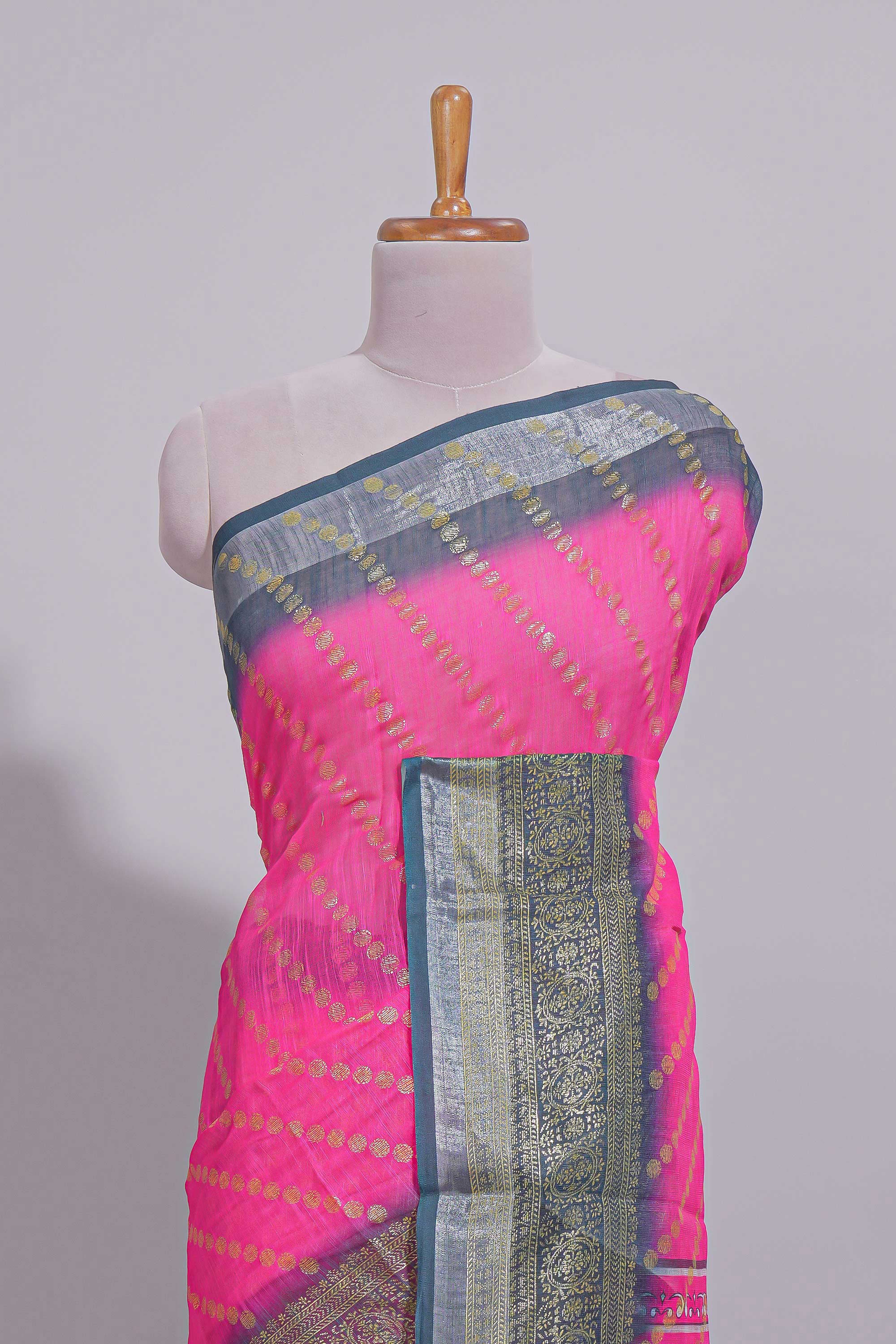 Pink colour linen cotton saree with zari striped body and contrast border with geometric pallu along with contrast blouse