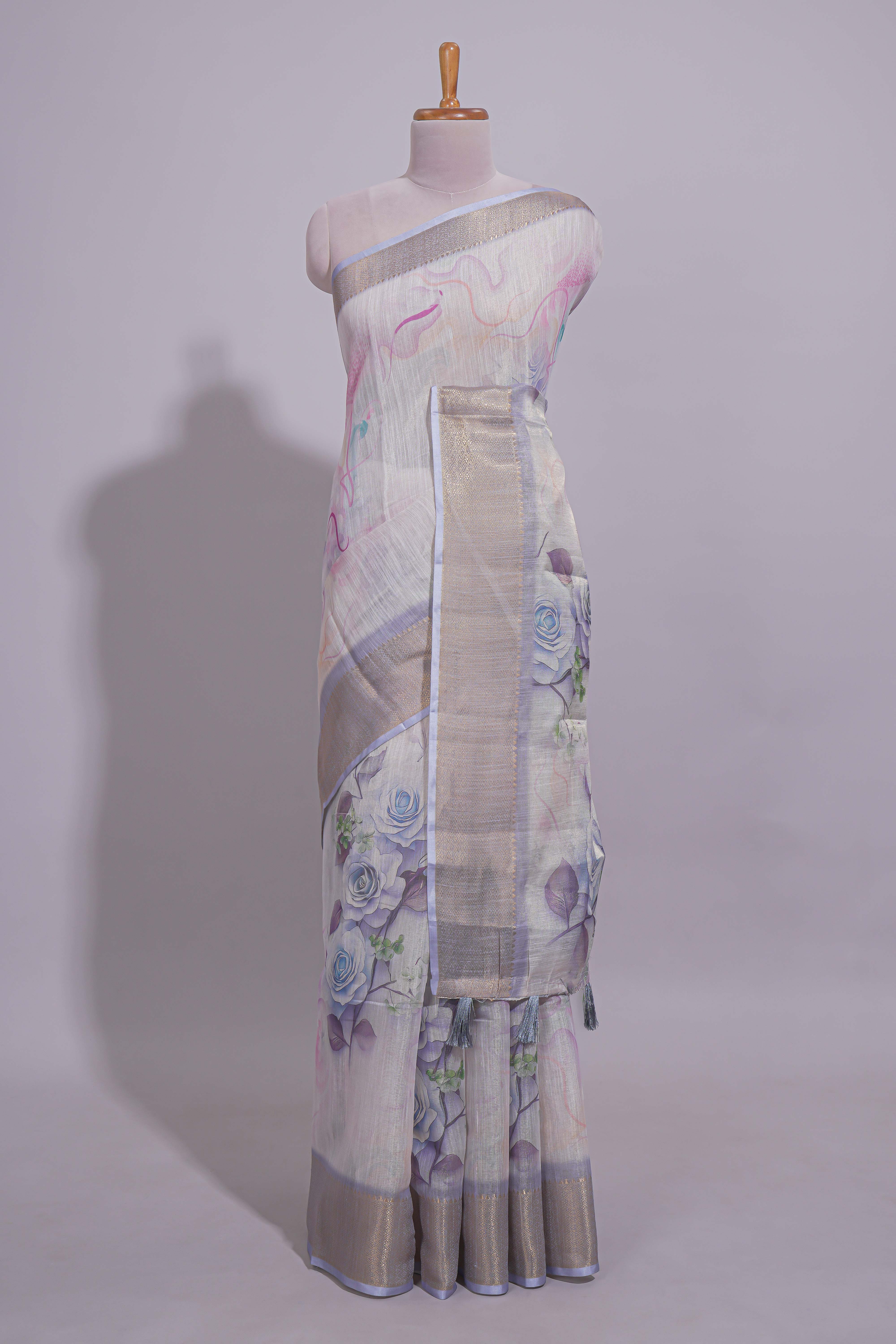 Ivory Floral printed linen cotton saree with contrast zariborder and self pallu along with contrast blouse