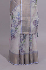 Ivory Floral printed linen cotton saree with contrast zariborder and self pallu along with contrast blouse