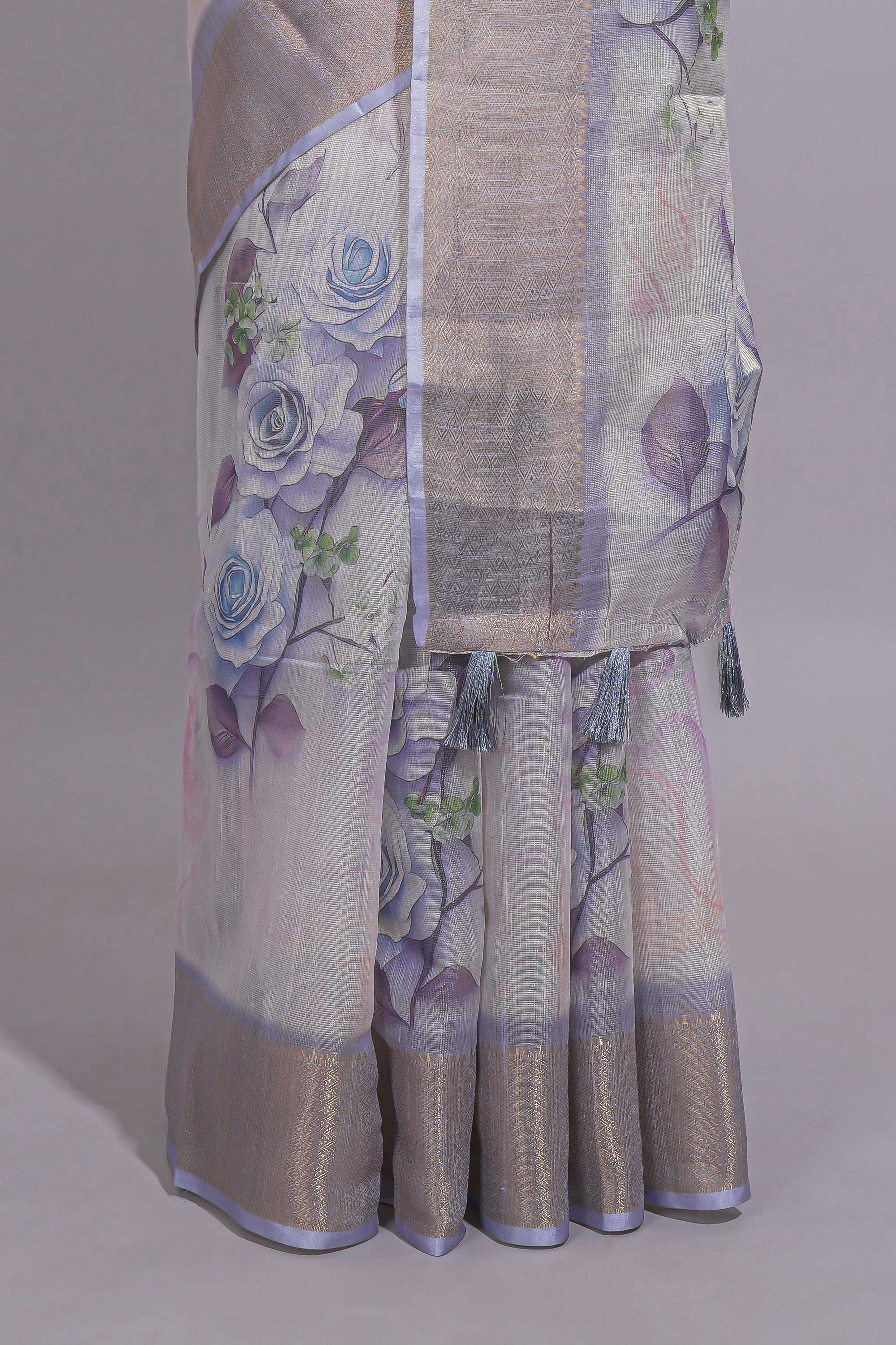 Ivory Floral printed linen cotton saree with contrast zariborder and self pallu along with contrast blouse