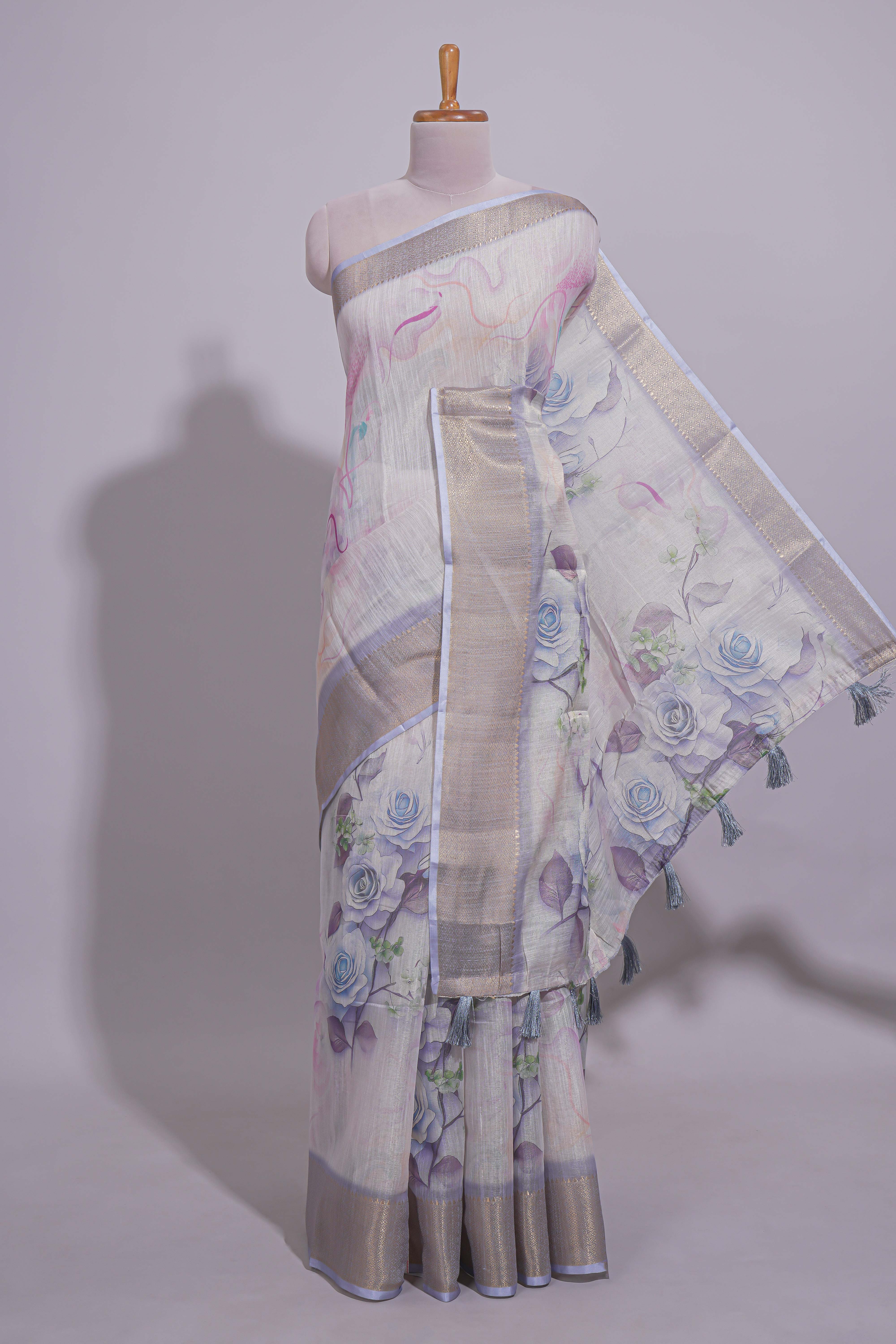 Ivory Floral printed linen cotton saree with contrast zariborder and self pallu along with contrast blouse