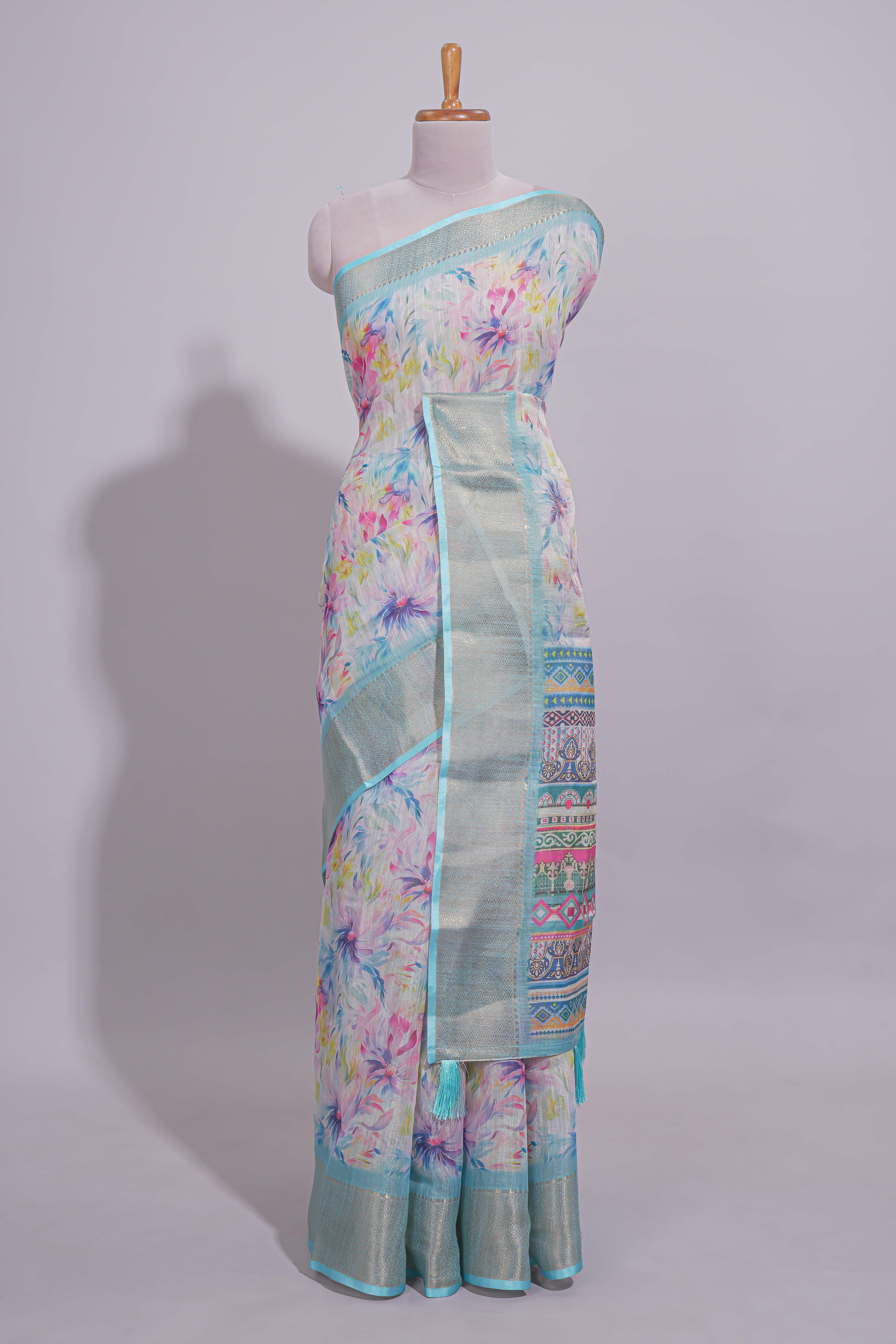 Ivory Floral linen cotton saree with contrast zariborder and self pallu along with contrast blouse