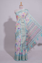 Ivory Floral linen cotton saree with contrast zariborder and self pallu along with contrast blouse