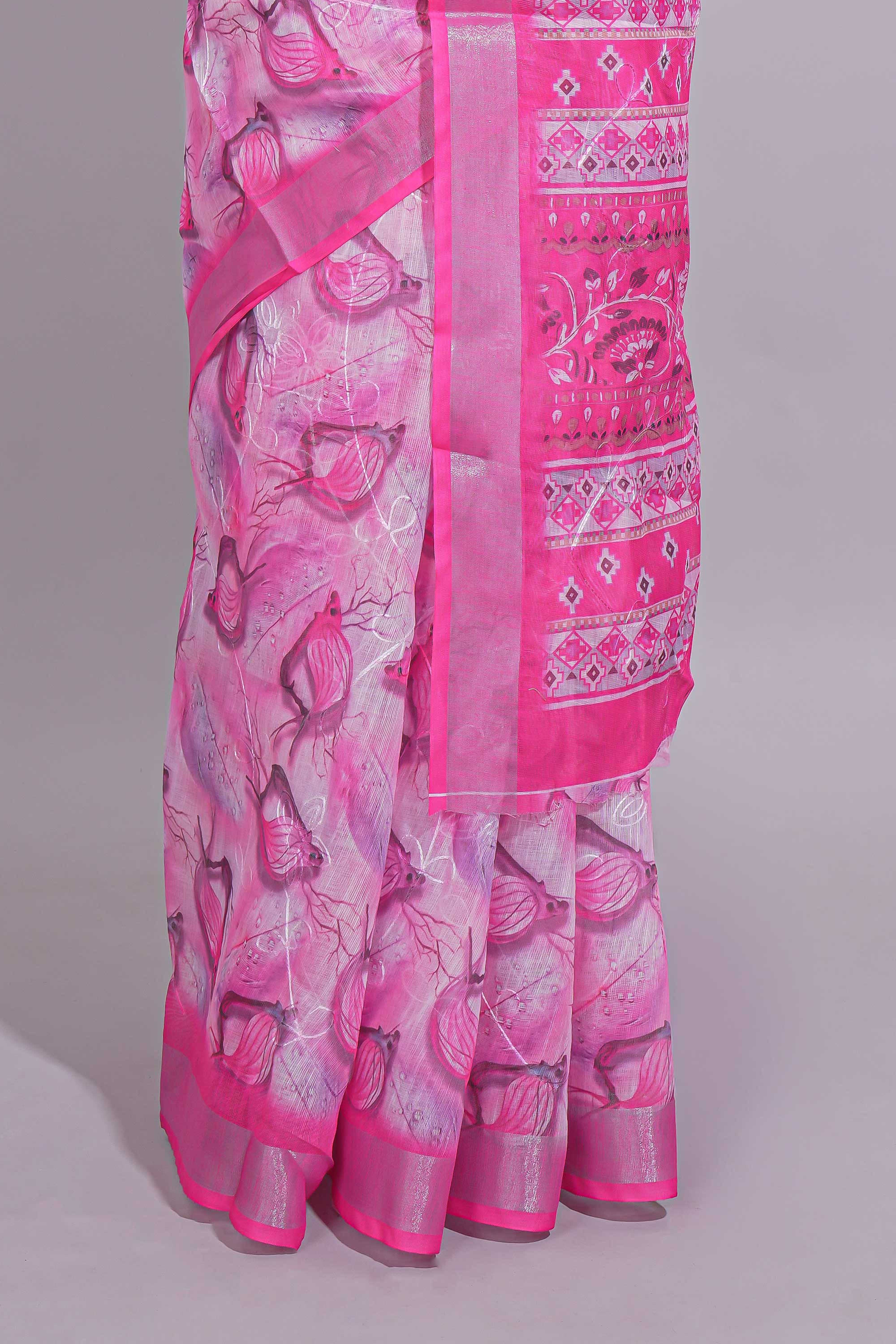 Pink Floral printed linen cotton saree with contrast zariborder and geometric pallu along with matching blouse