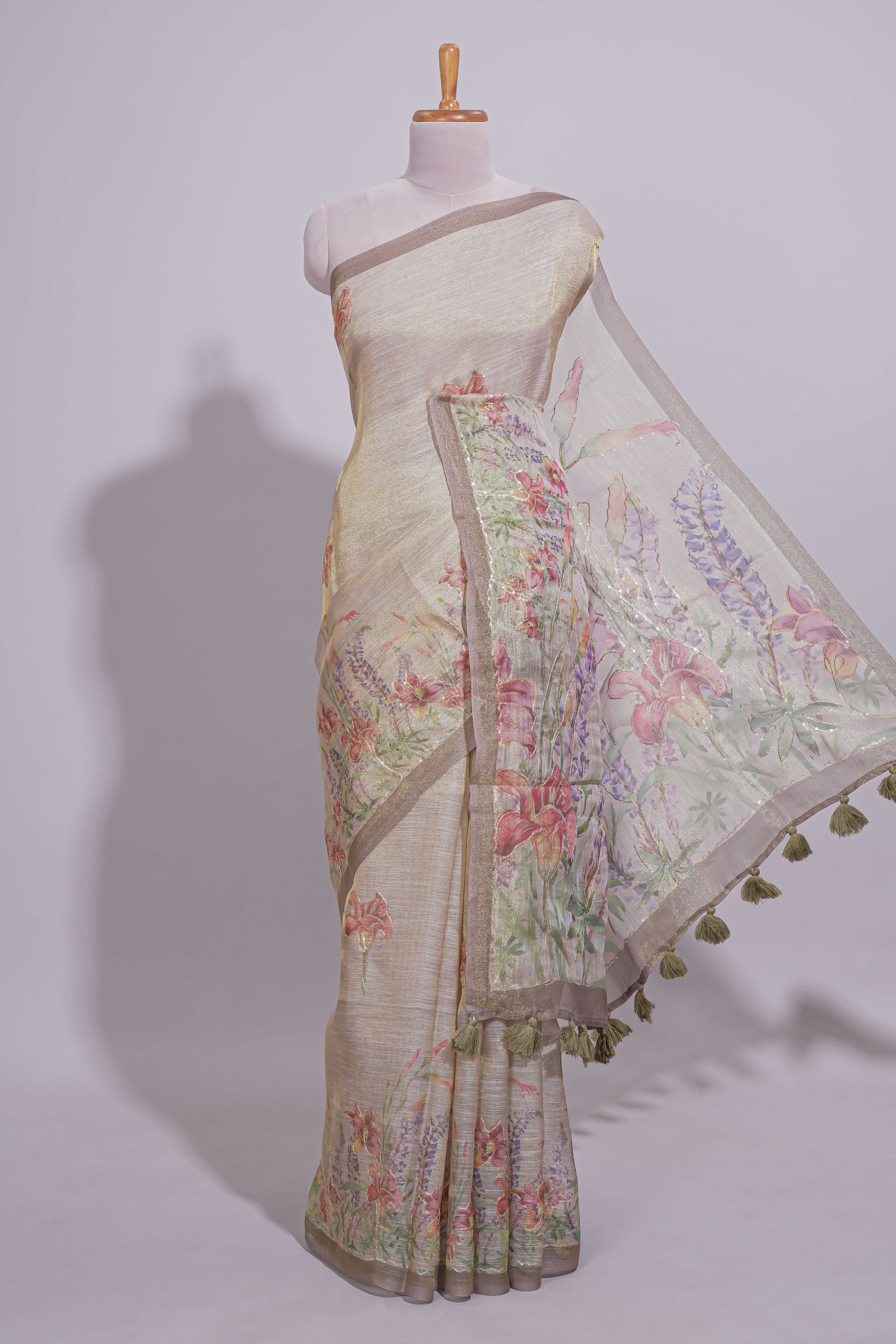 Soft olive green Floral printed linen cotton saree with contrast zariborder and self pallu along with matching blouse