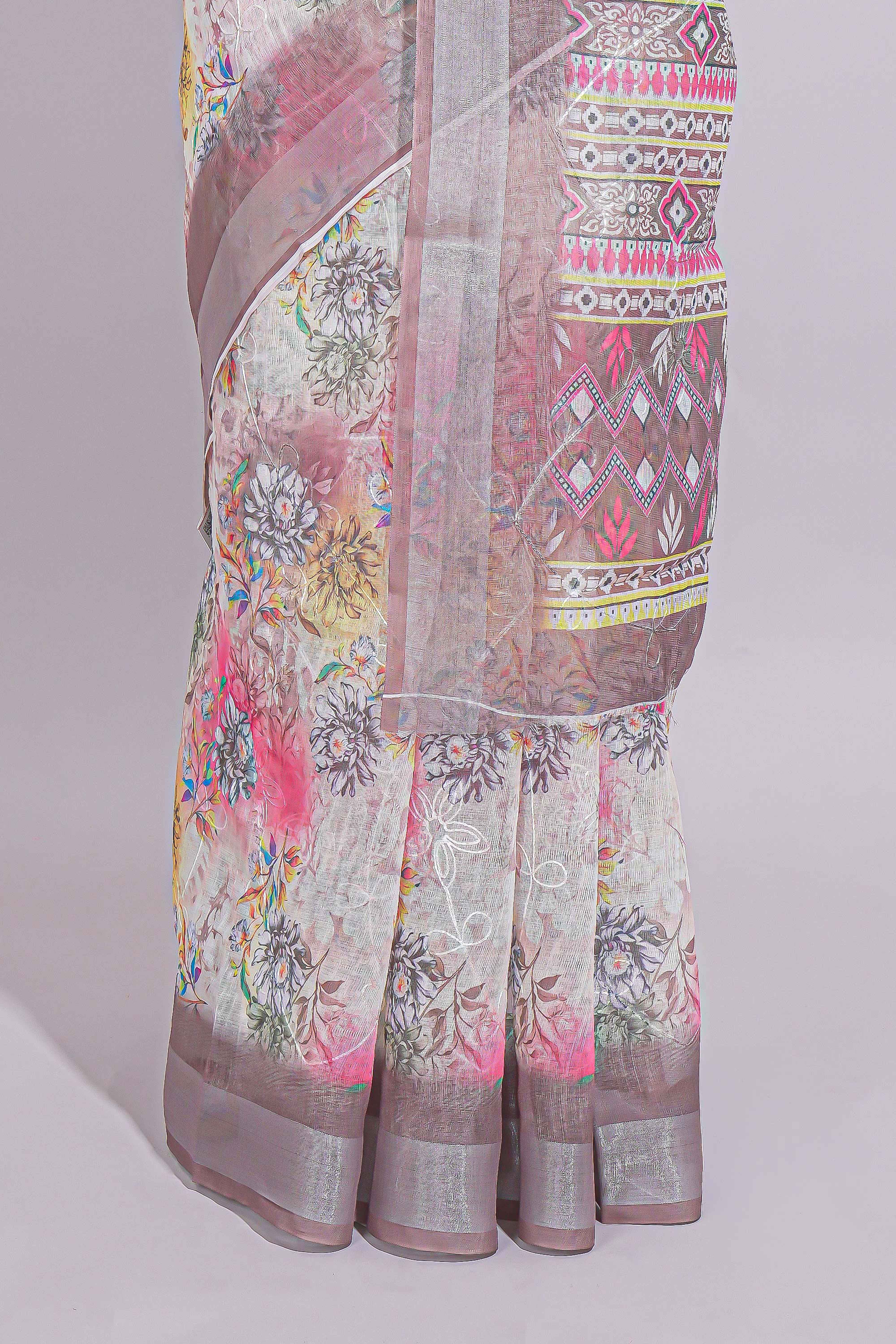 White Florallinen cotton saree with contrast zariborder and geometric pallu along with matching blouse