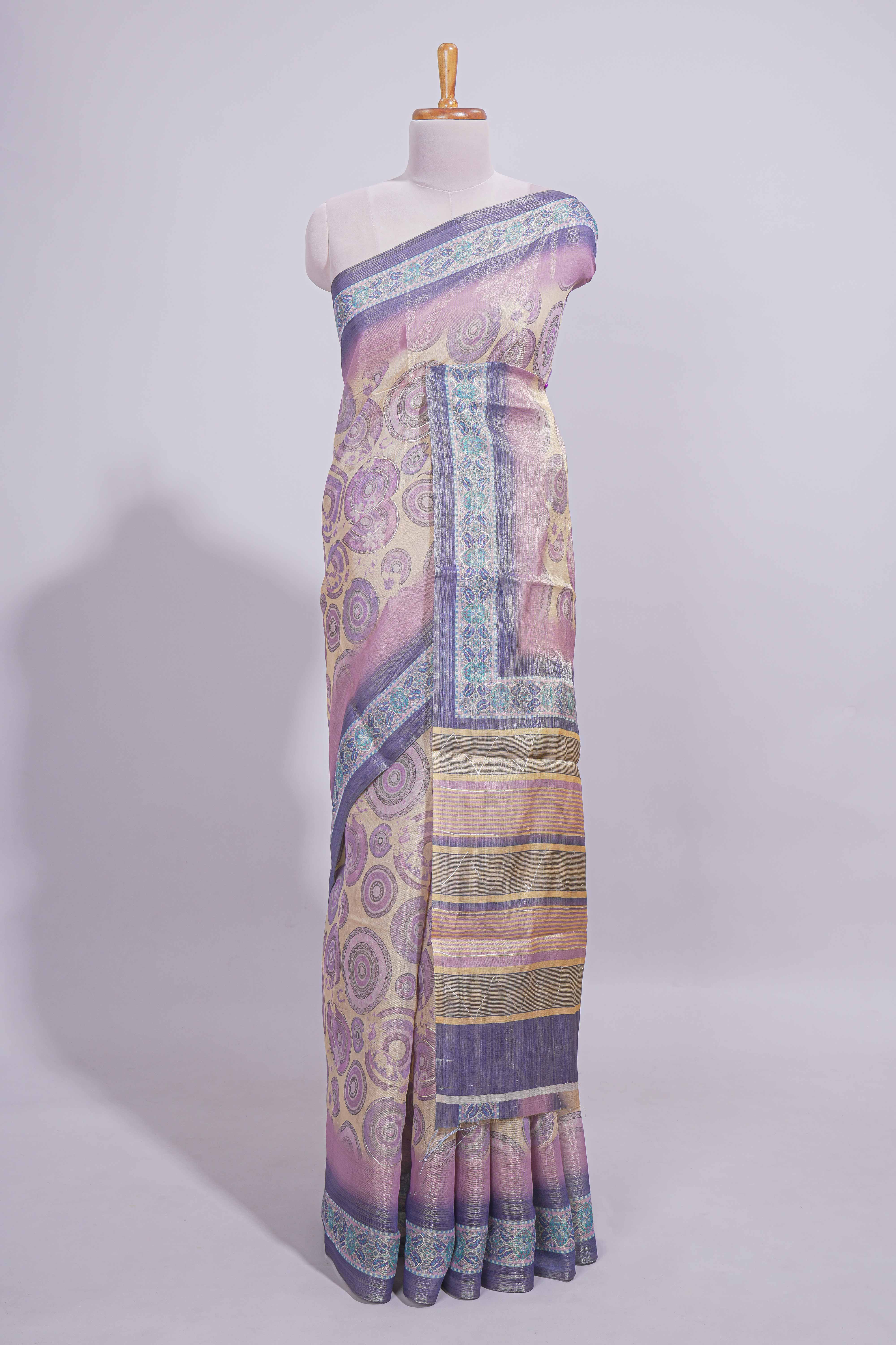Beige colour linen cotton saree with geometric design body and contrast border with geometric pallu along with matching blouse