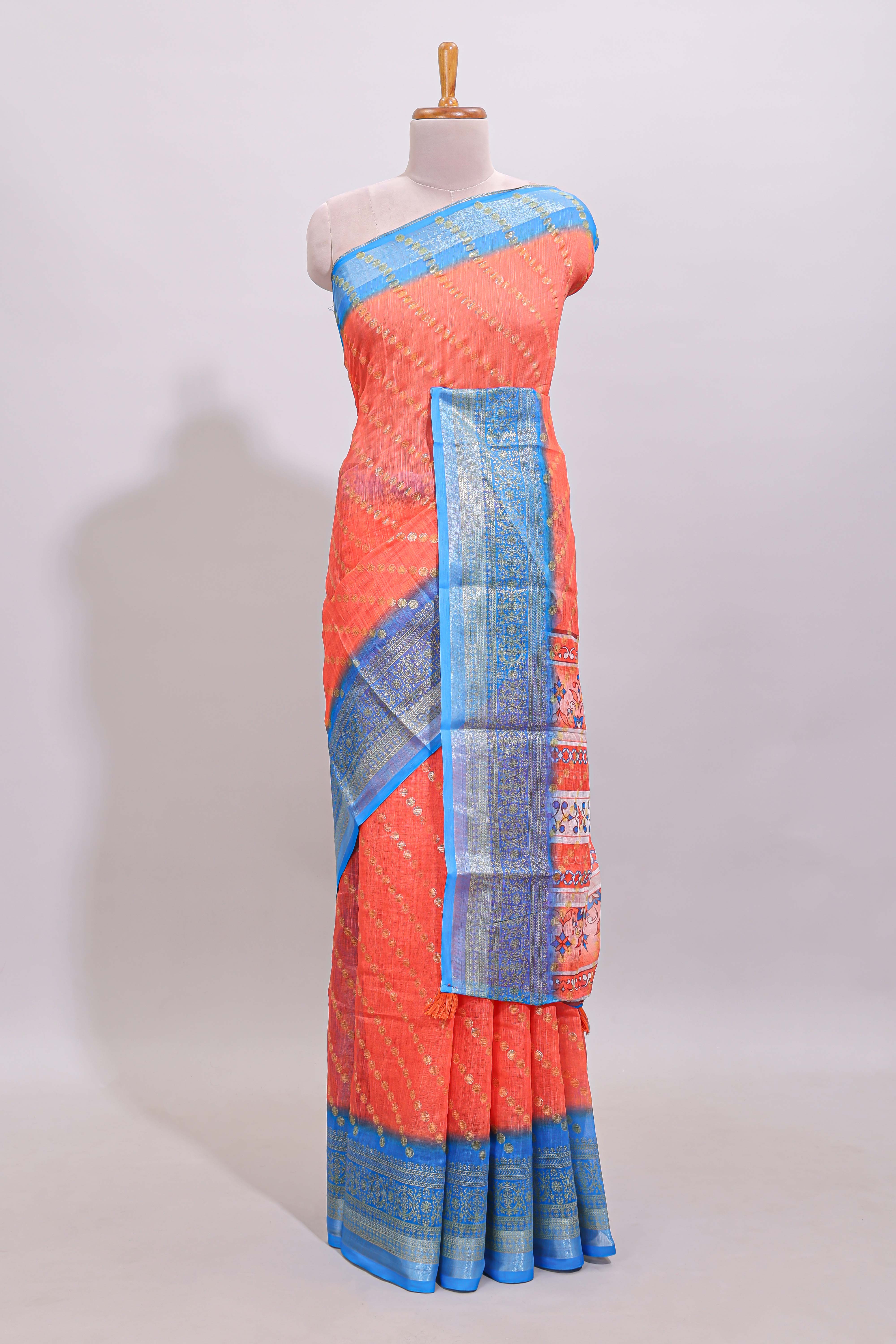 Orange color circle motifs linen cotton saree with contrast border and matching blouse