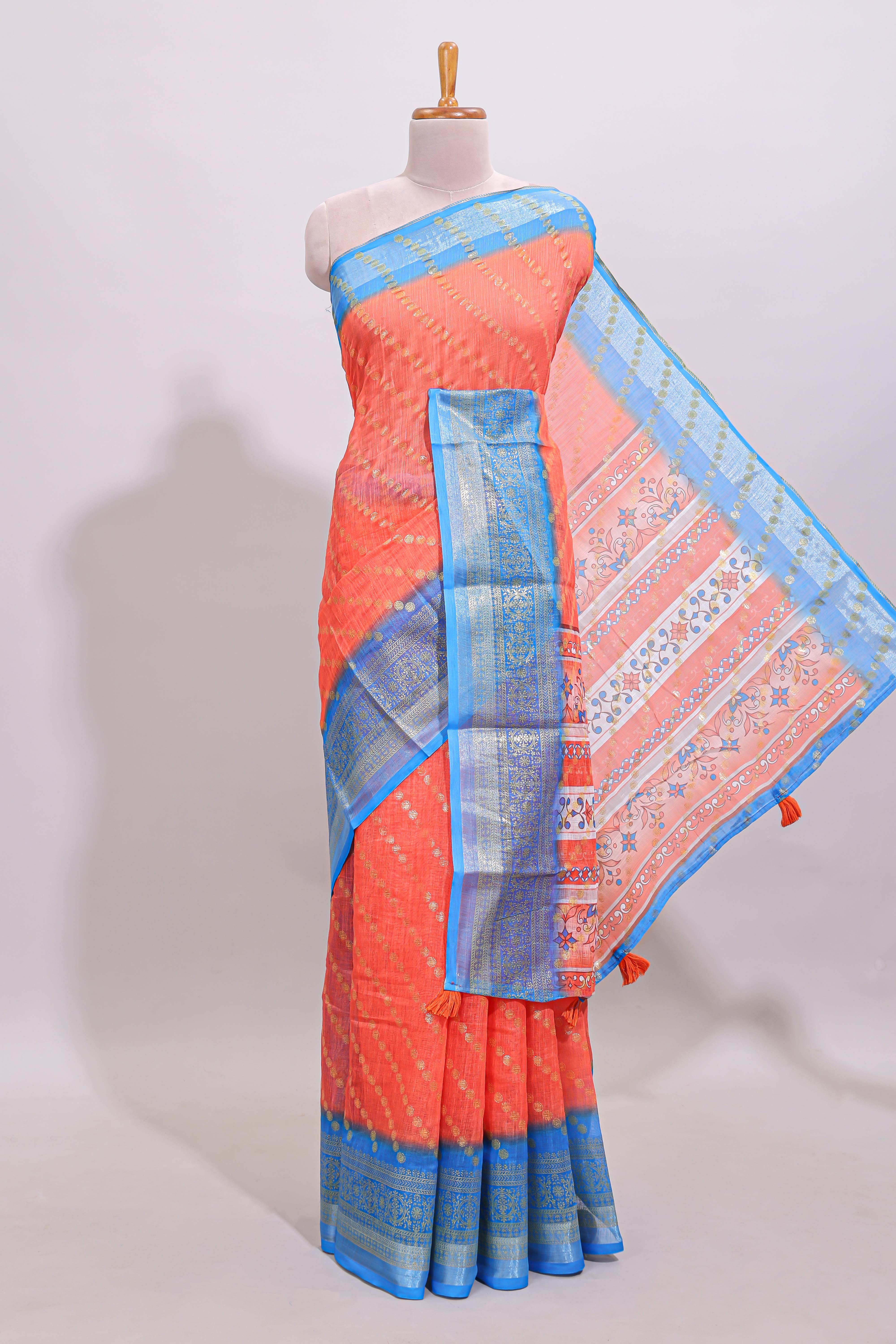 Orange color circle motifs linen cotton saree with contrast border and matching blouse