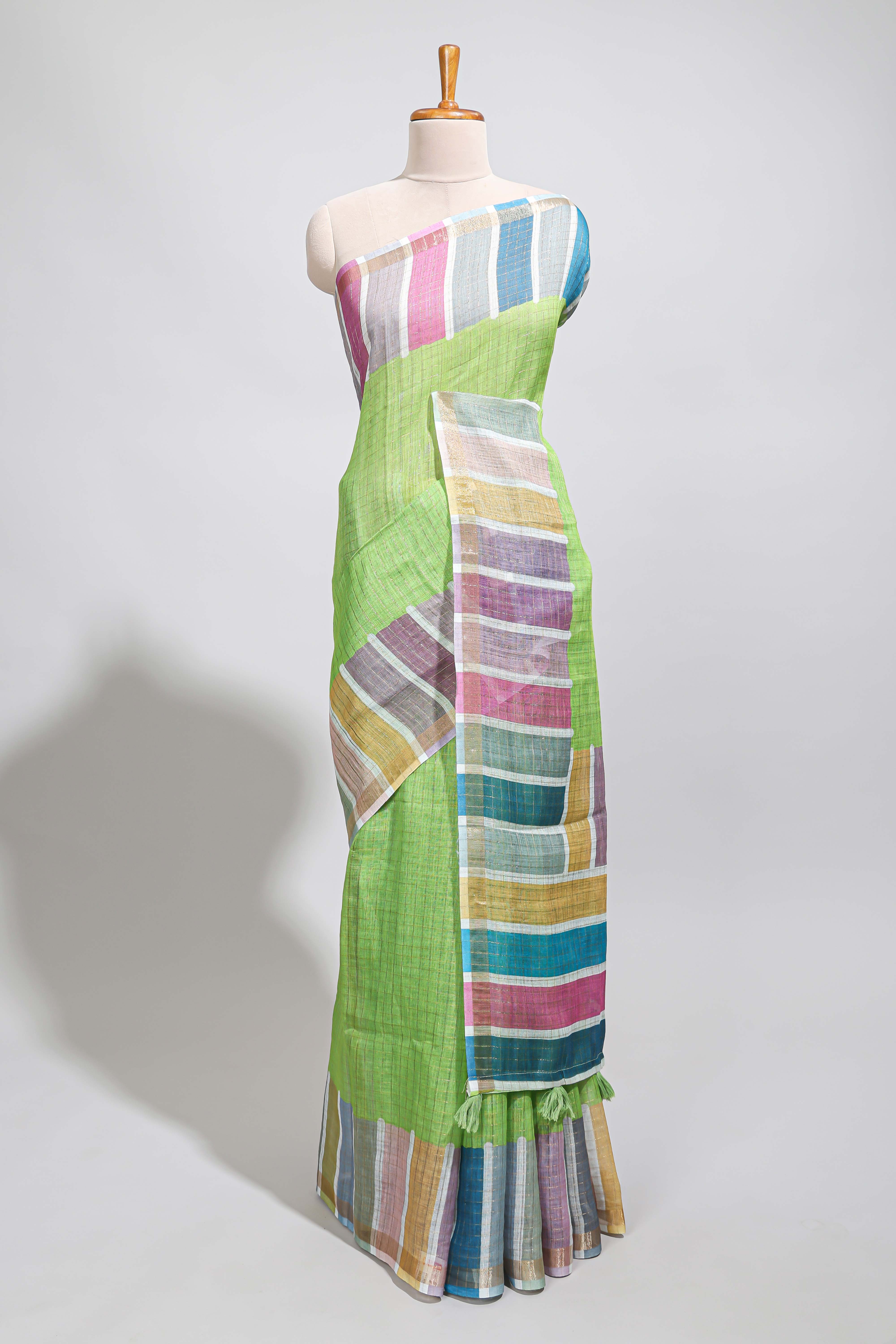 Green zari checked design linen cotton saree with contrast multi color border and blouse