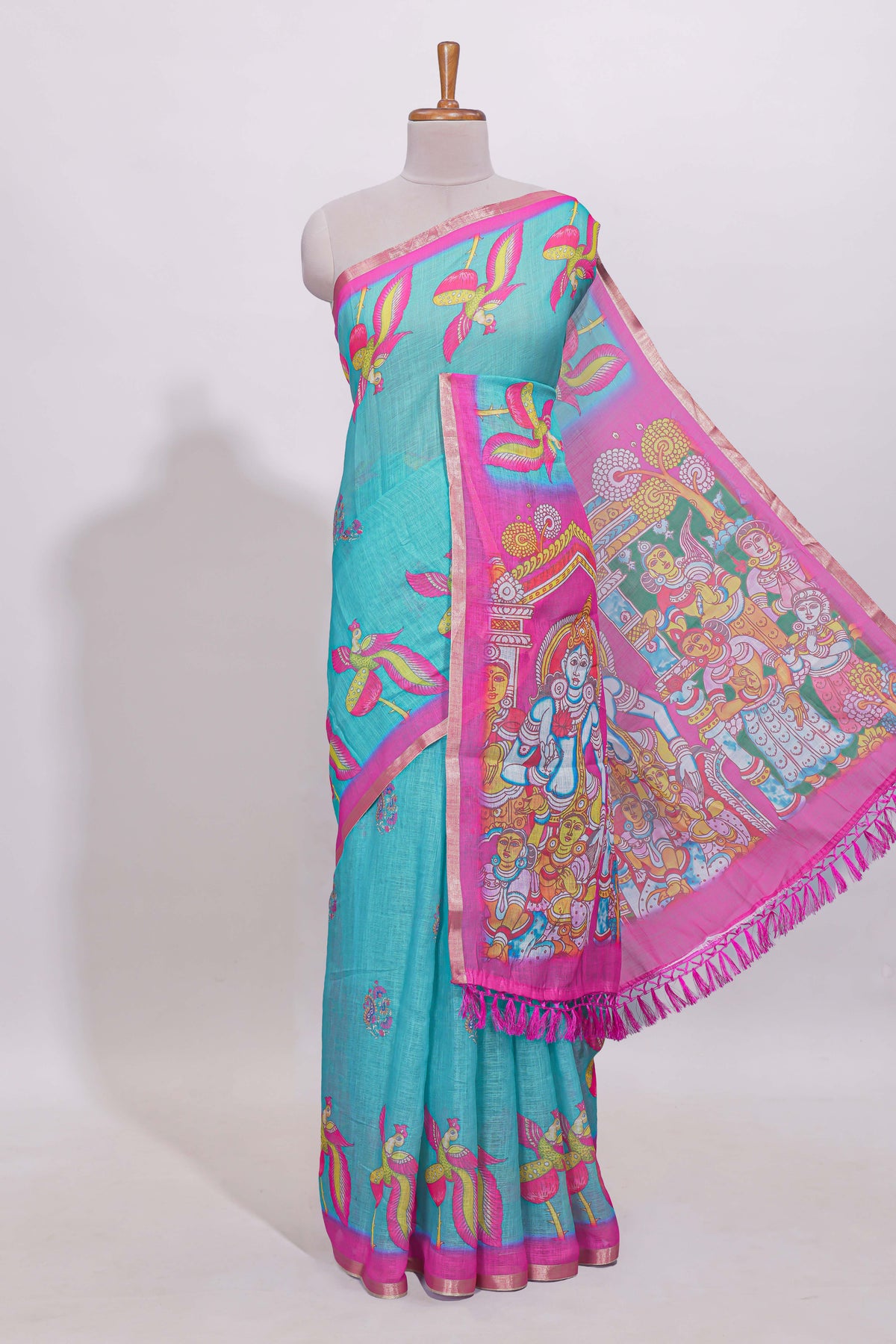 Blue stylized bird motifs linen cotton saree with contrast border and blouse