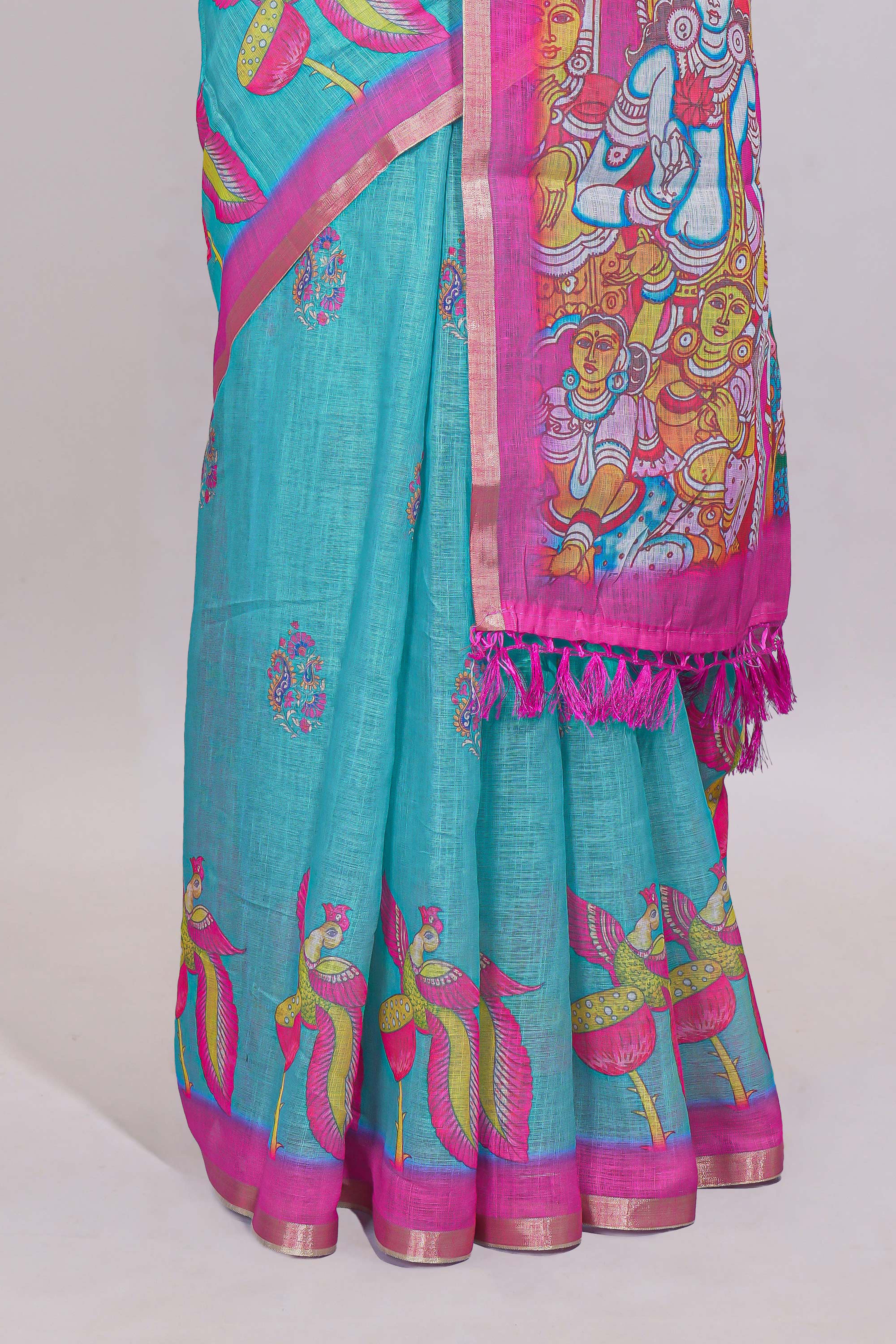 Blue stylized bird motifs linen cotton saree with contrast border and blouse