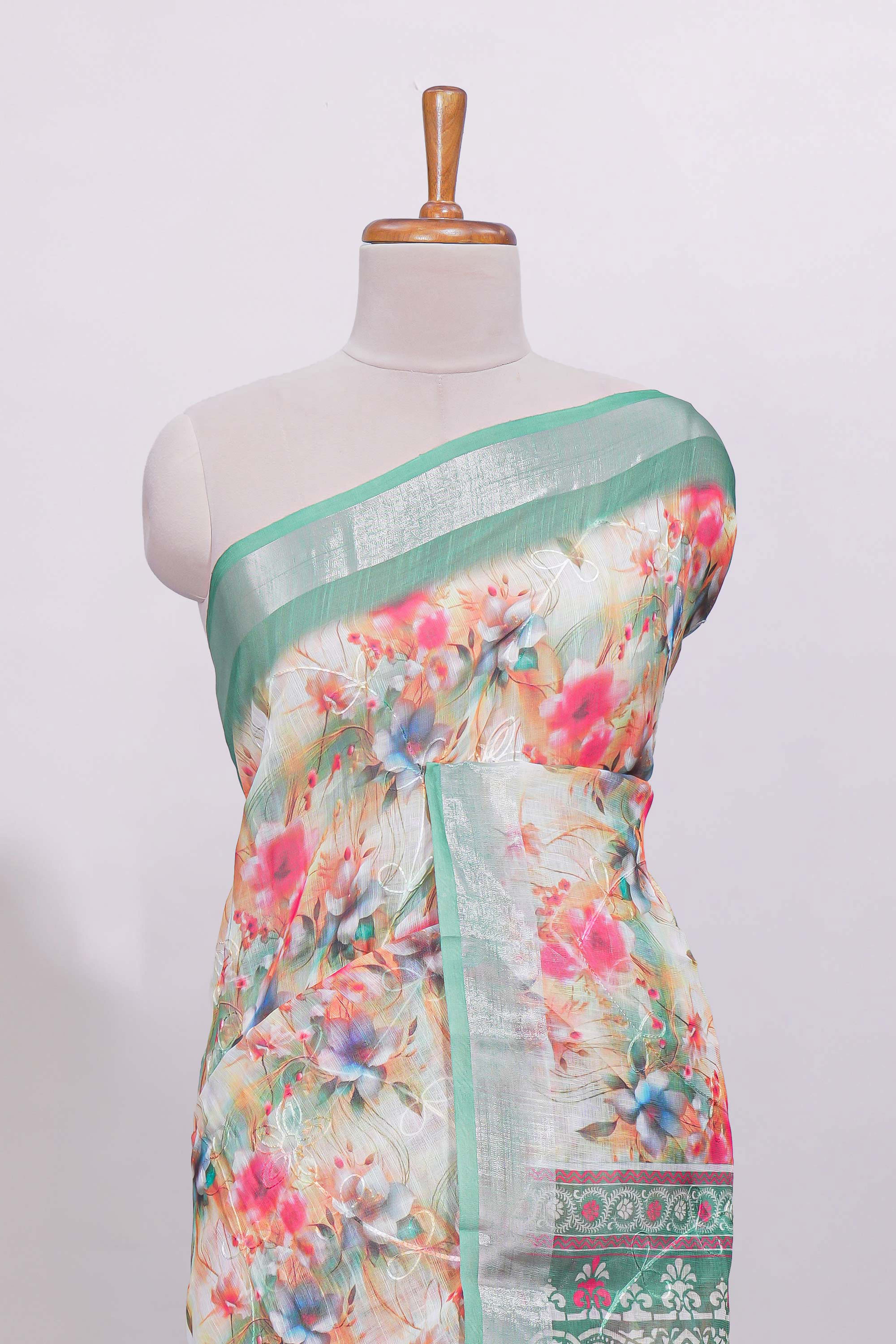 Multicolor floral designed linen cotton saree with contrast zari border and matching blouse
